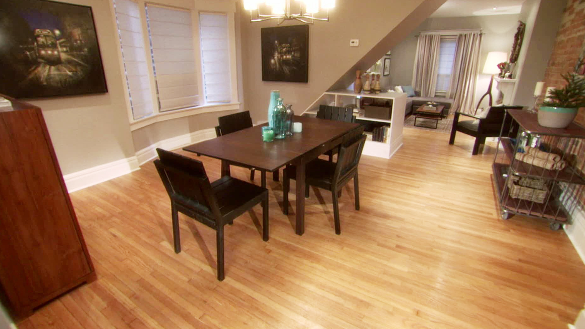 Wooden-Table-And-4-Chairs-Dining-Room-With-White-Cabinet-Cool-Chandelier-Shader-on-Windows-Frames.jpeg