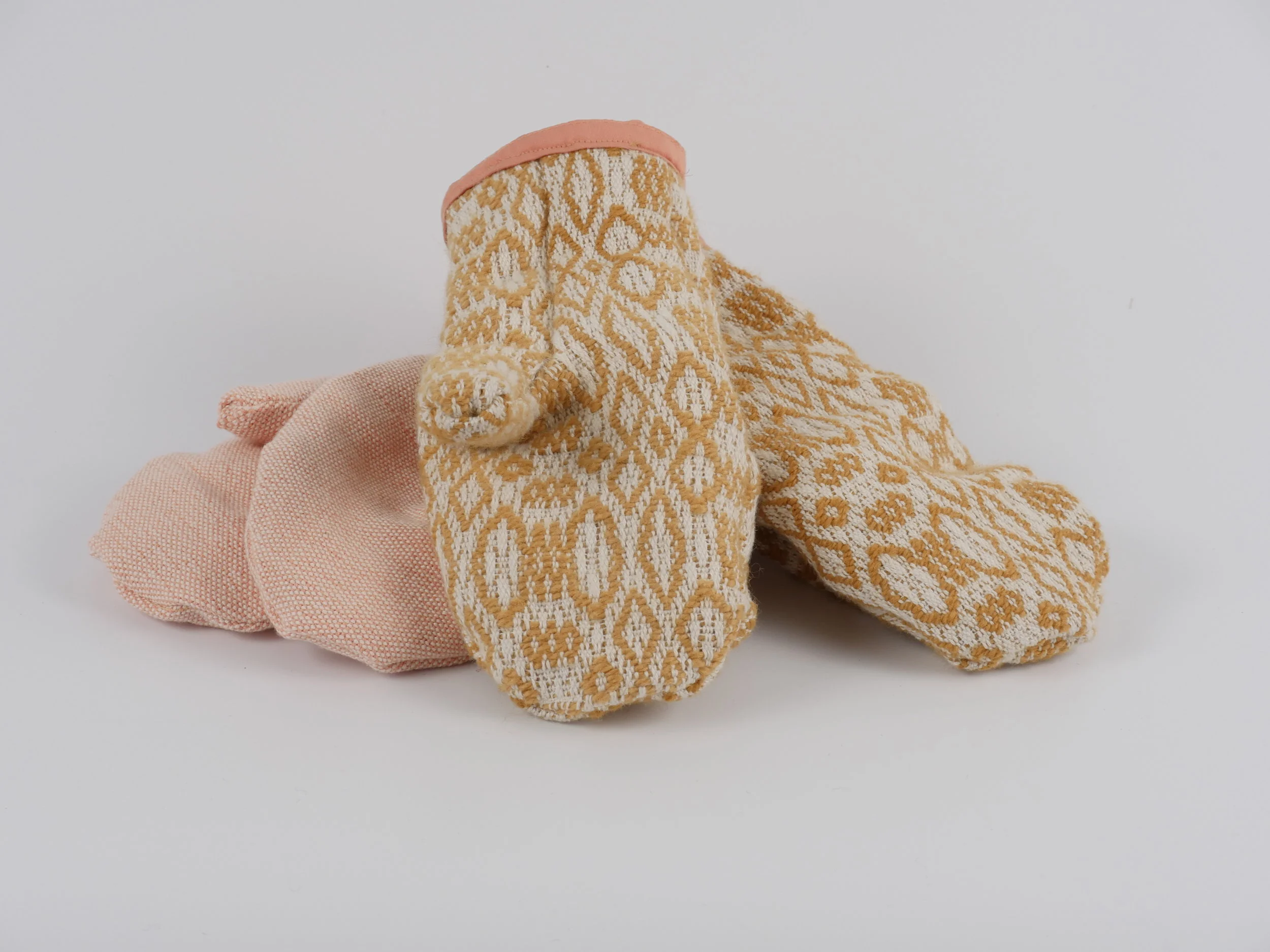  two pairs of handwoven mittens 