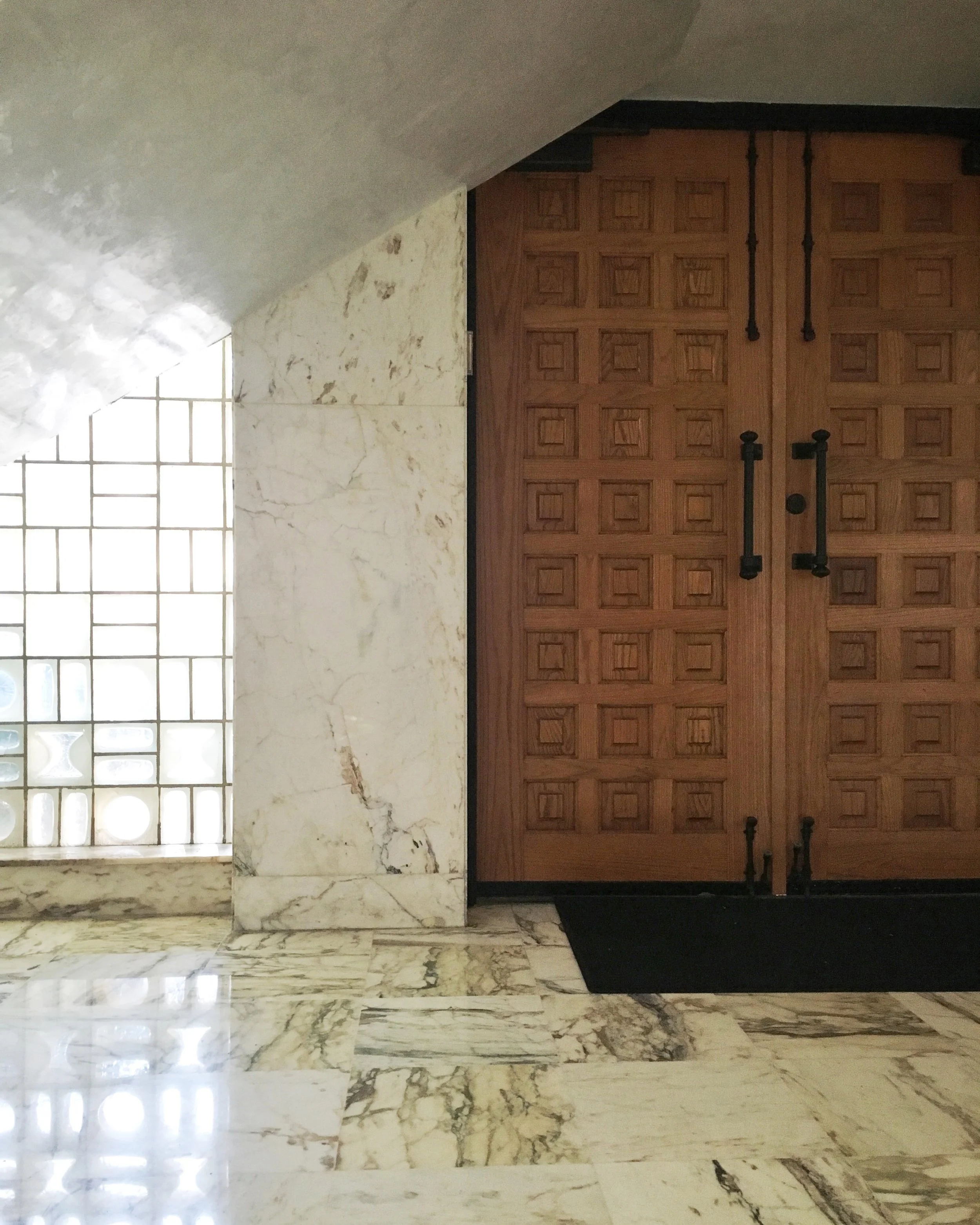 ELV's front door faces Washington Avenue and opens into the marbled foyer.
