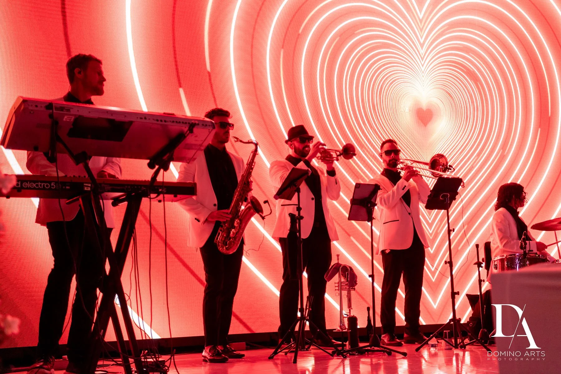 Brand activation event in Miami Beach venue featuring large LED wall display