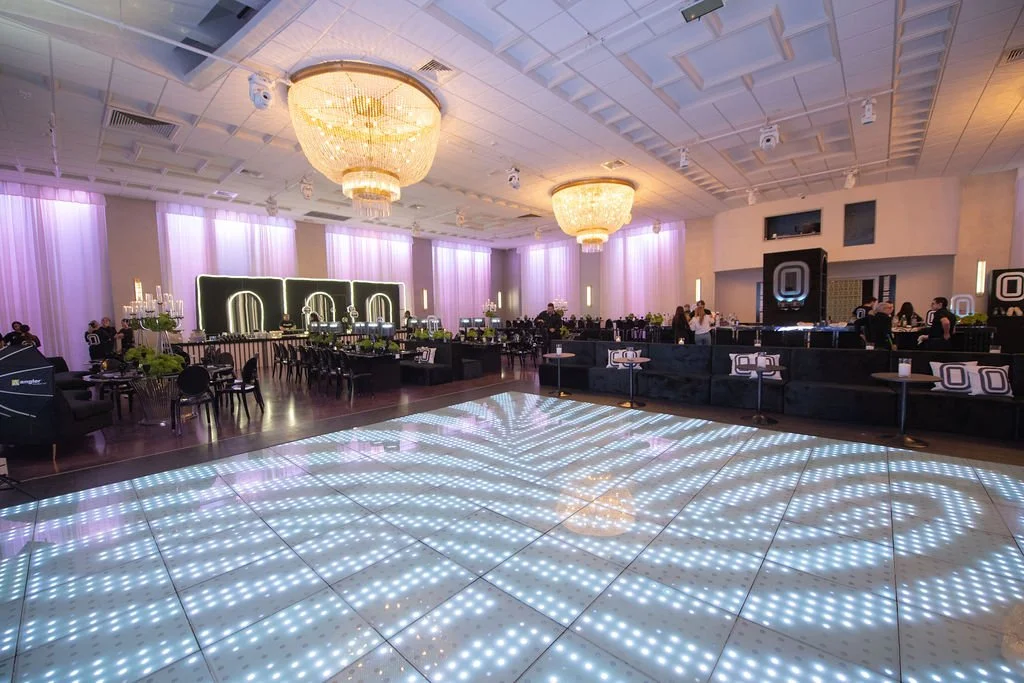 Bar Mitzvah event in Miami Beach with LED dance floor, luxury lounge seating and custom lighting at a modern Miami event venue