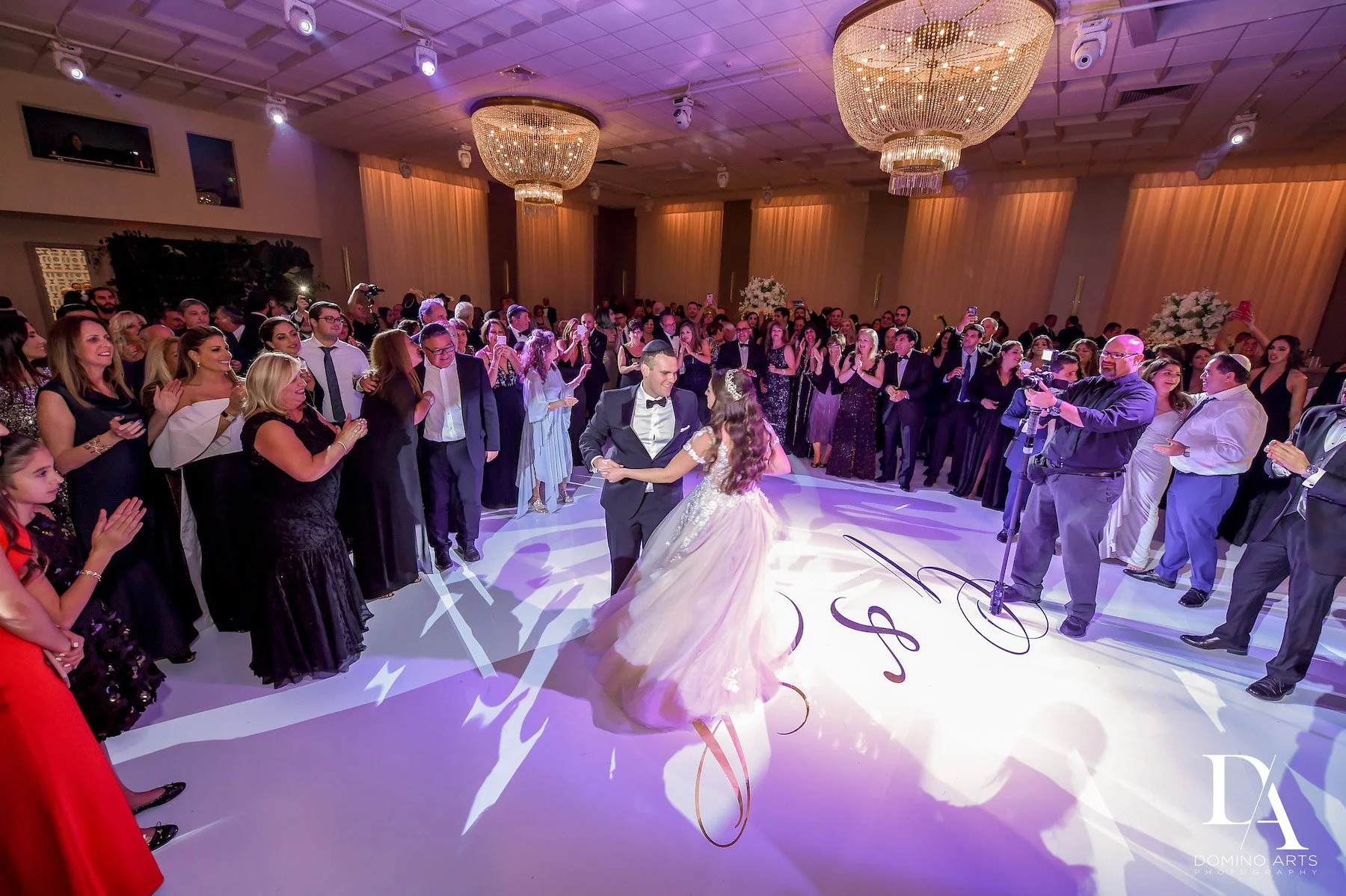 Wedding guests dancing at top Miami ballroom venue