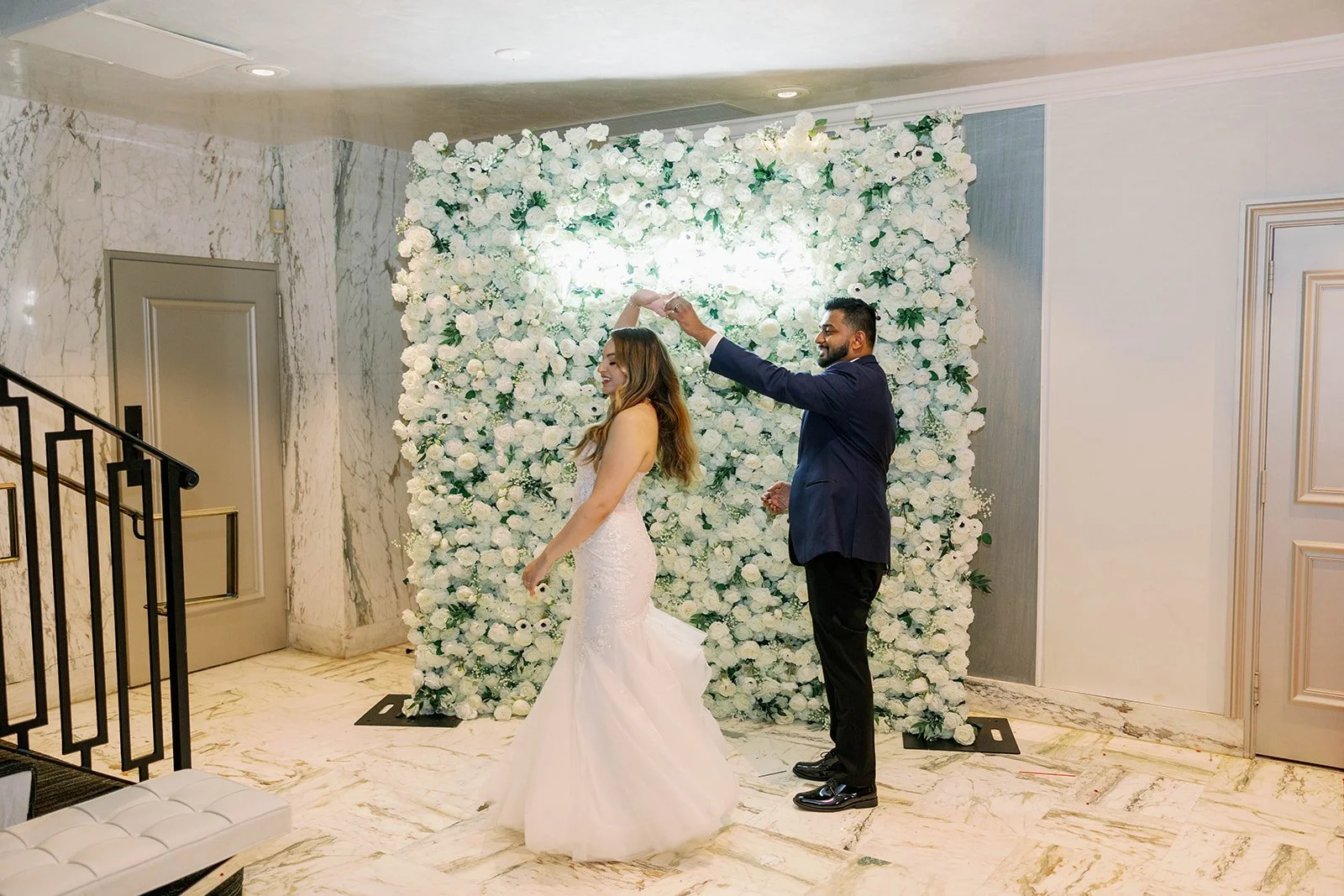 Newly married couple enjoying their reception at Emanuel Luxury Venue, one of the best wedding venues in Miami.