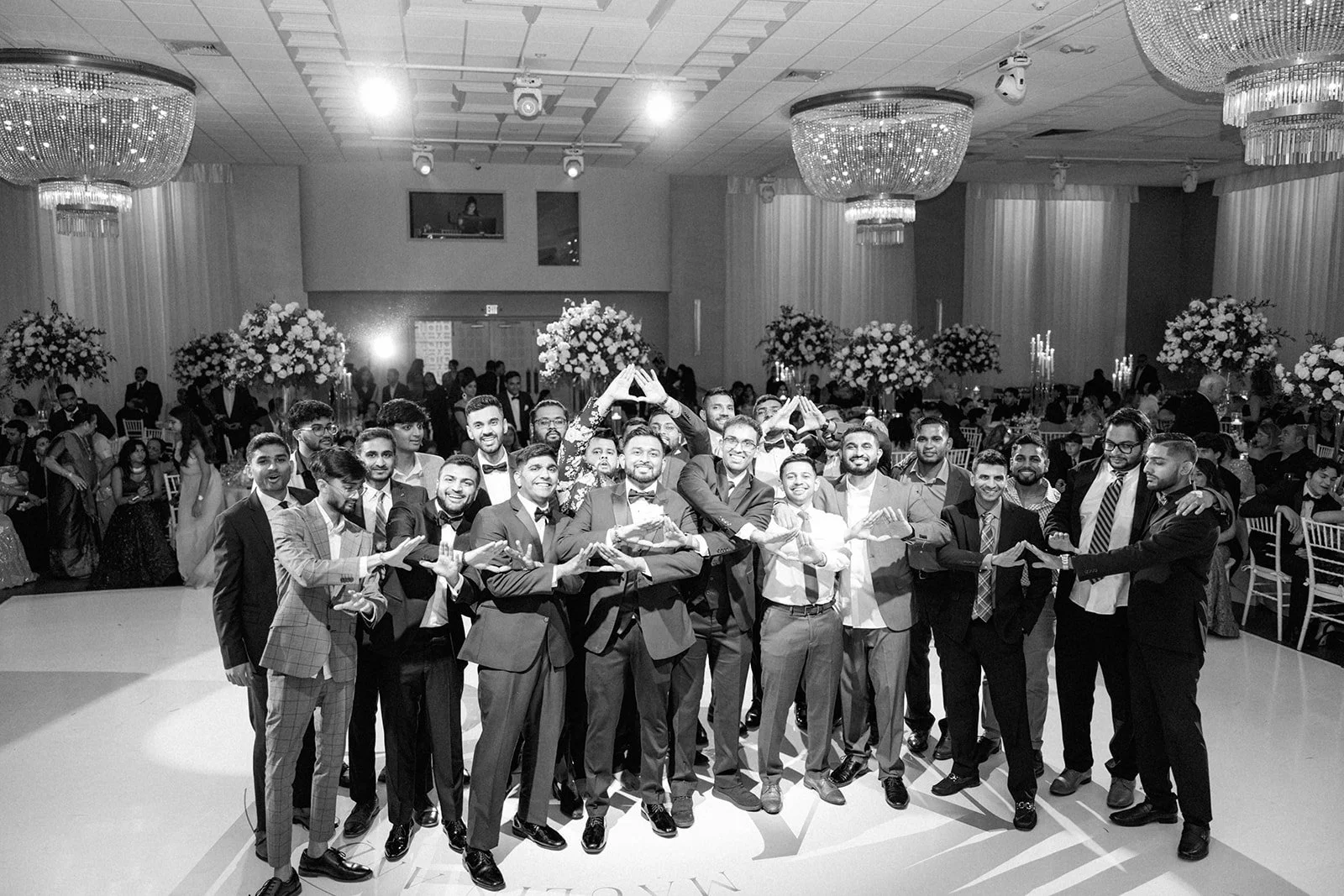 Wedding guests celebrating together at Emanuel Luxury Venue, one of the best wedding venues in Miami.