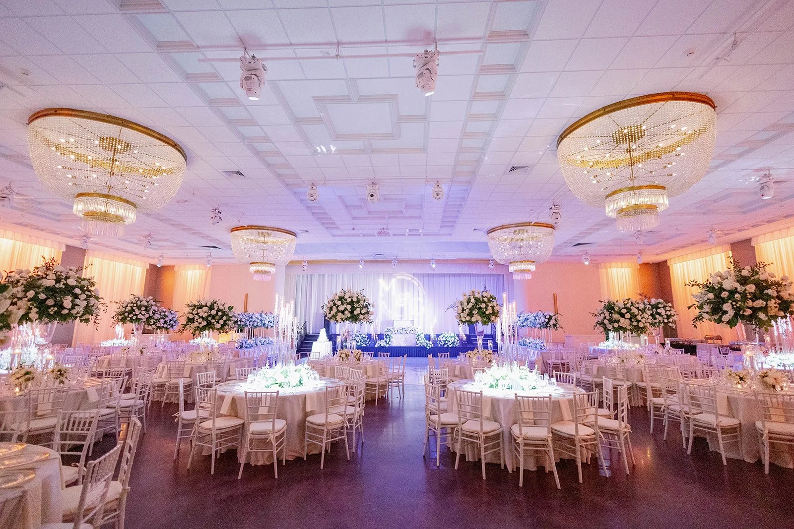 Beautifully styled wedding tables and floral decor at a Miami Beach wedding venue.