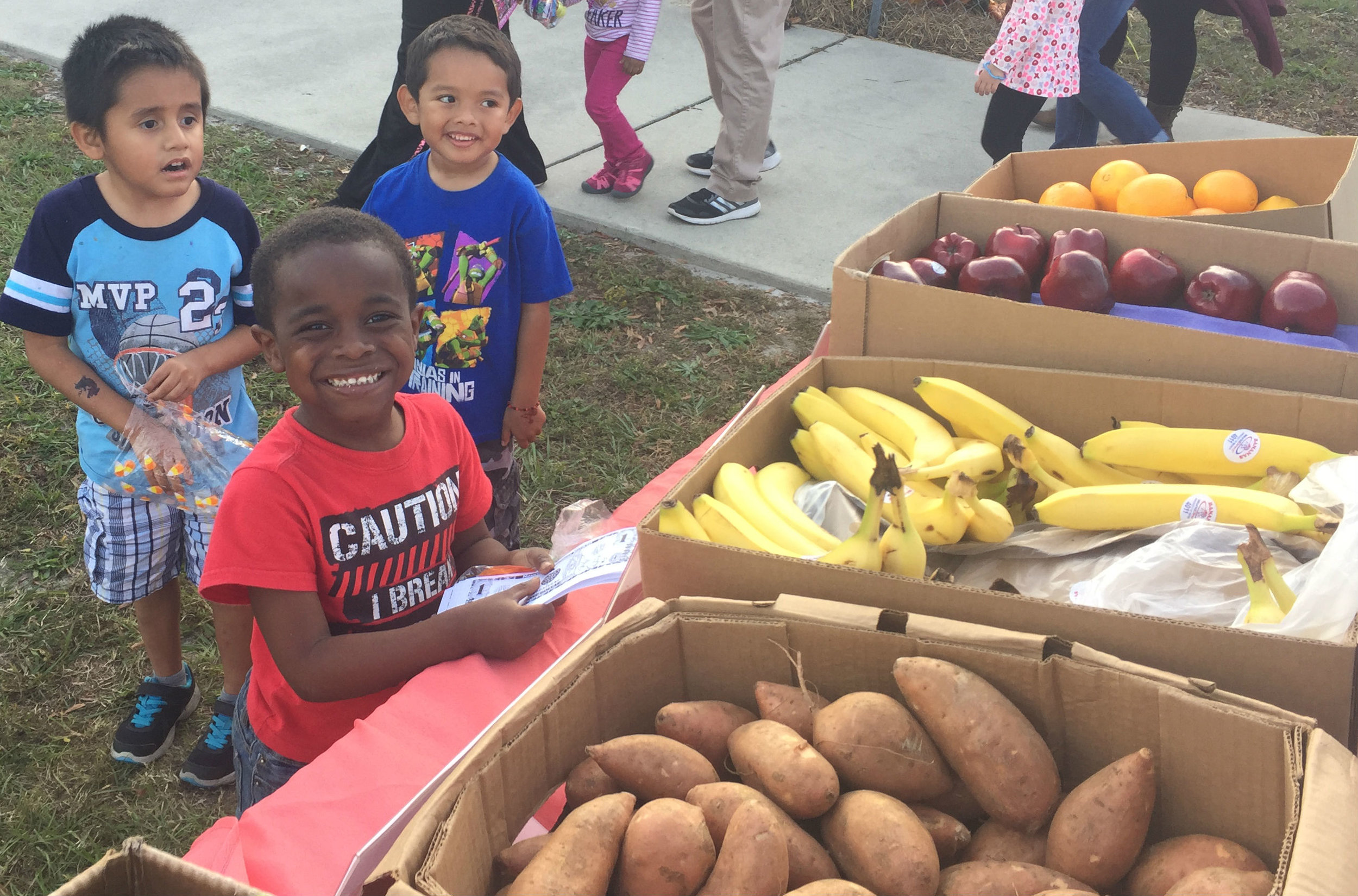 3 kids w fruit.jpg