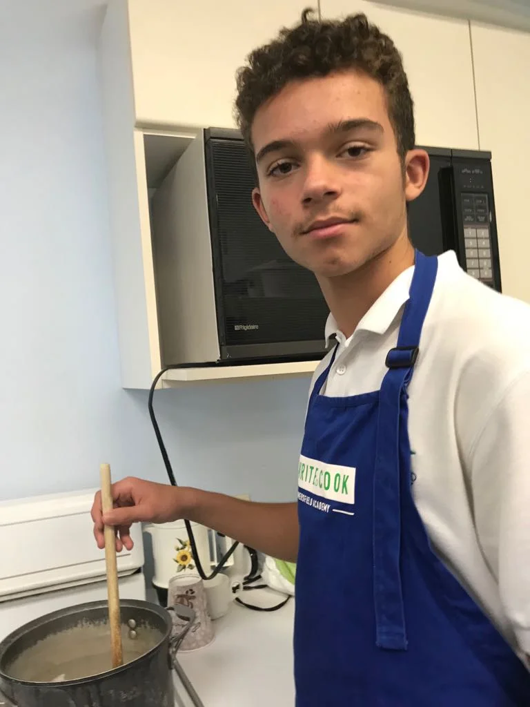 Tyler stirs the pot.jpeg