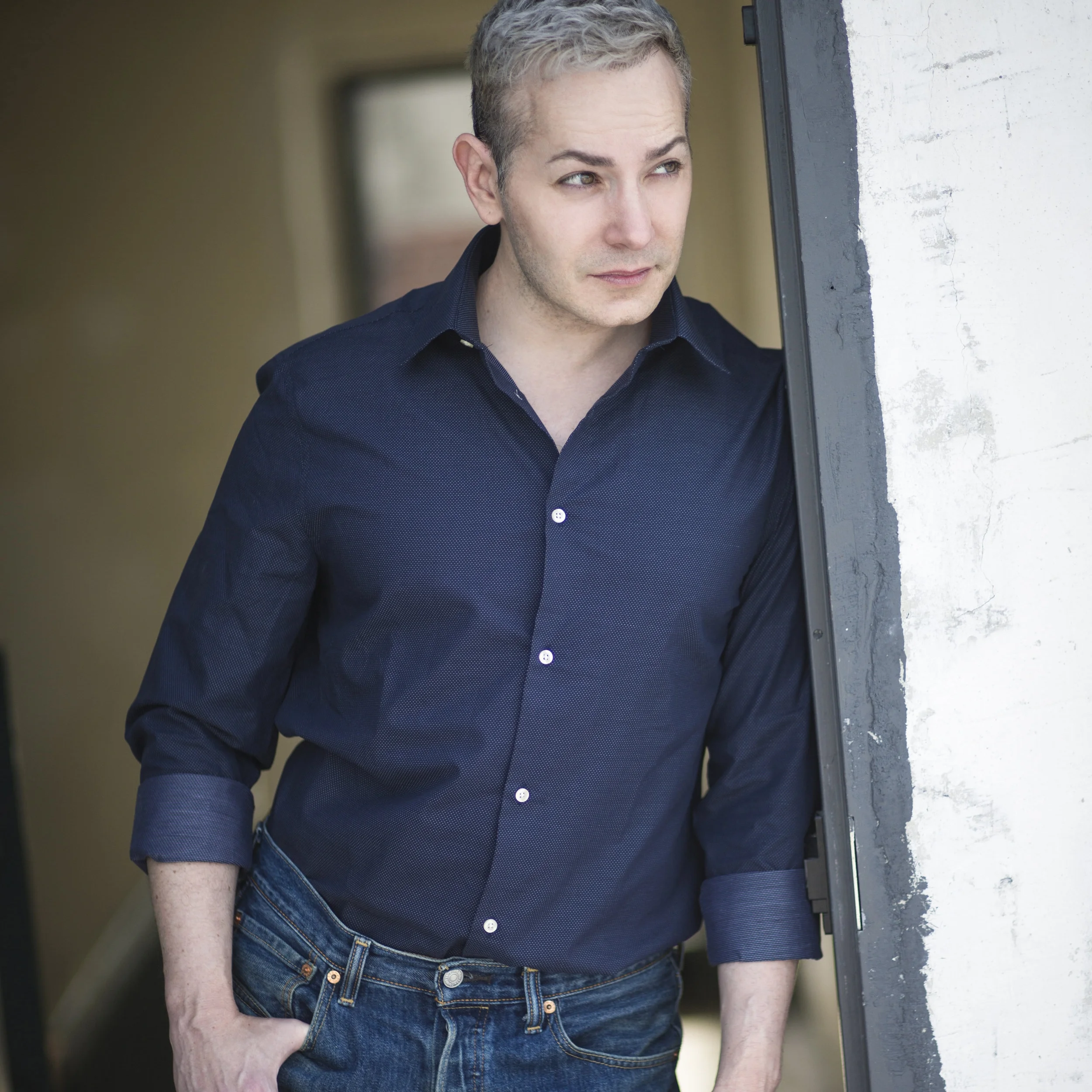 standing blue shirt.jpg