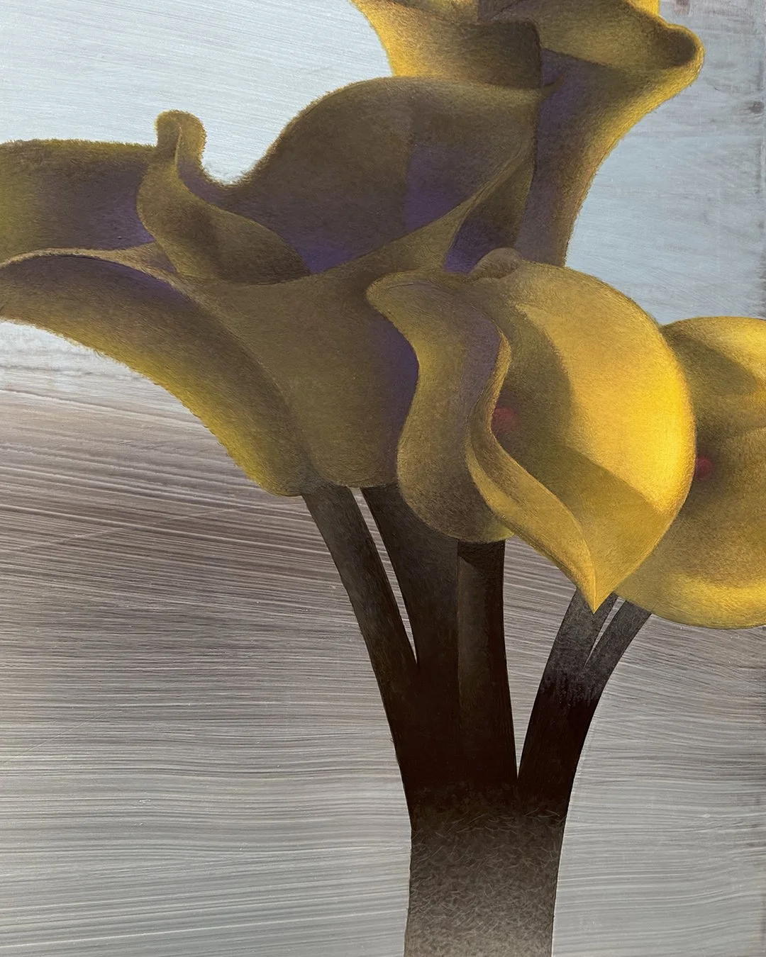 A painting of yellow, abstracted cala lillies