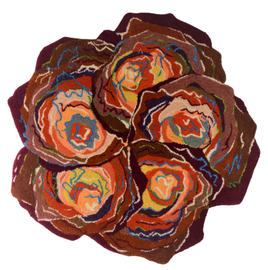 Colorful abstract floral-inspired rug with swirling patterns in shades of brown, orange, yellow, red, blue, and green.
