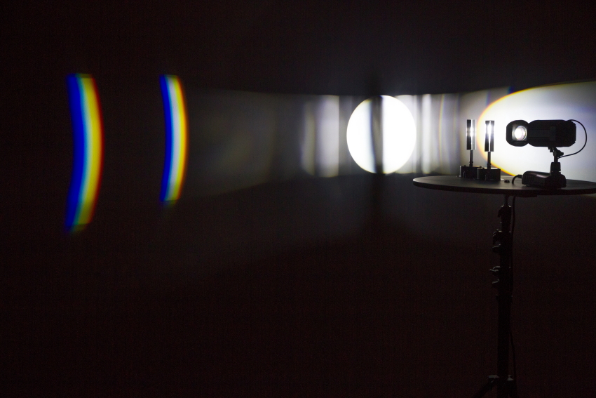  Michaela Gleave,&nbsp; Eclipse Machine (Retrograde Motion) , 2015 Projection lamp, motors, optical glass, timber, stand 90 x 90 x 140cm 