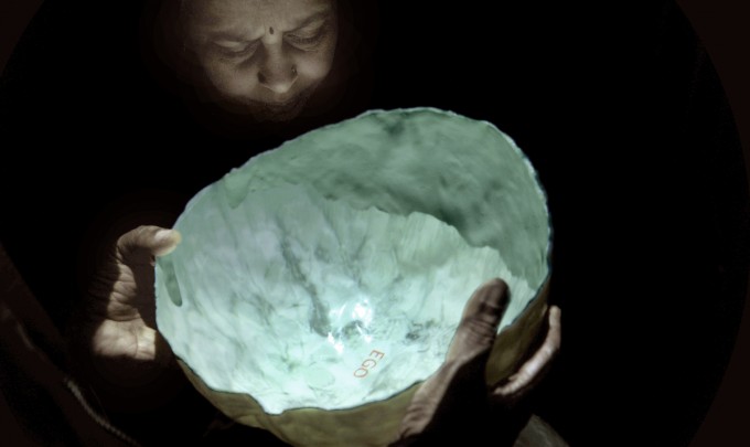 Elisabeth Weissensteiner, Mirror Brain , 2011, projected animation, polyester resin, fibreglass, pigment, 35cm diameter