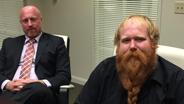 Licensed medical cannabis growers Ted Hicks, left, and Ryan Mears of Big Red Farms, in their attorney's Sacramento office, were the subject of an armed law enforcement raid in September, though they are considered by Yolo County officials to be model growers. (Robin Abcarian / Los Angeles Times)