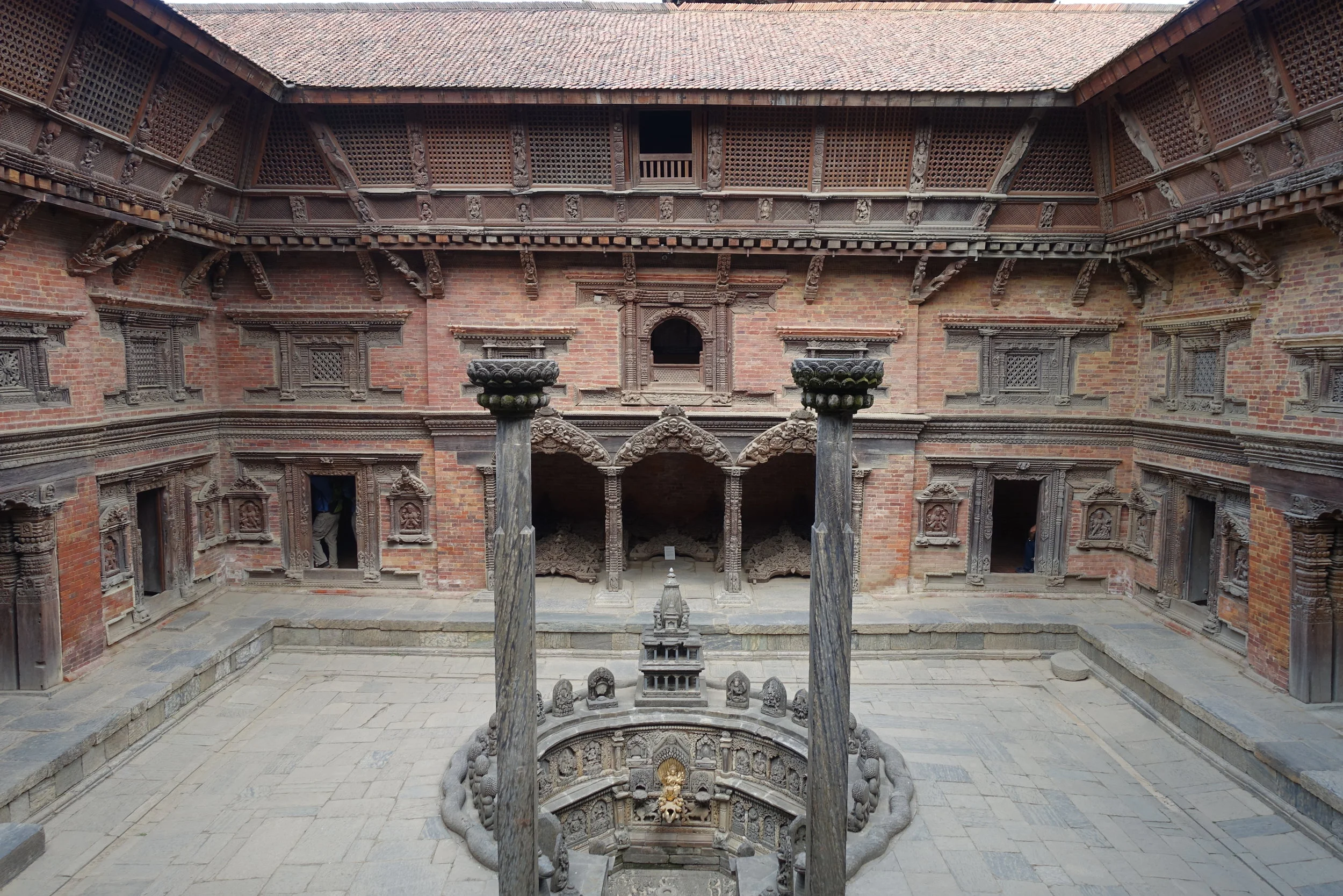Each window and door jamb and lintel has amazingly detailed Newari carving.