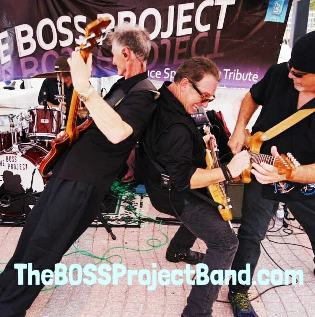 CARY ON DRUMS, TOMMY, PAUL & STEVE HAVING SOME FUN ON STAGE (L TO R)