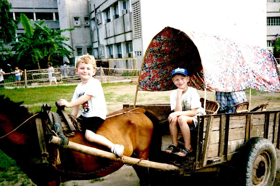 Raising our two sons in Bucharest, Romania! They were four and seven years old in this photo.