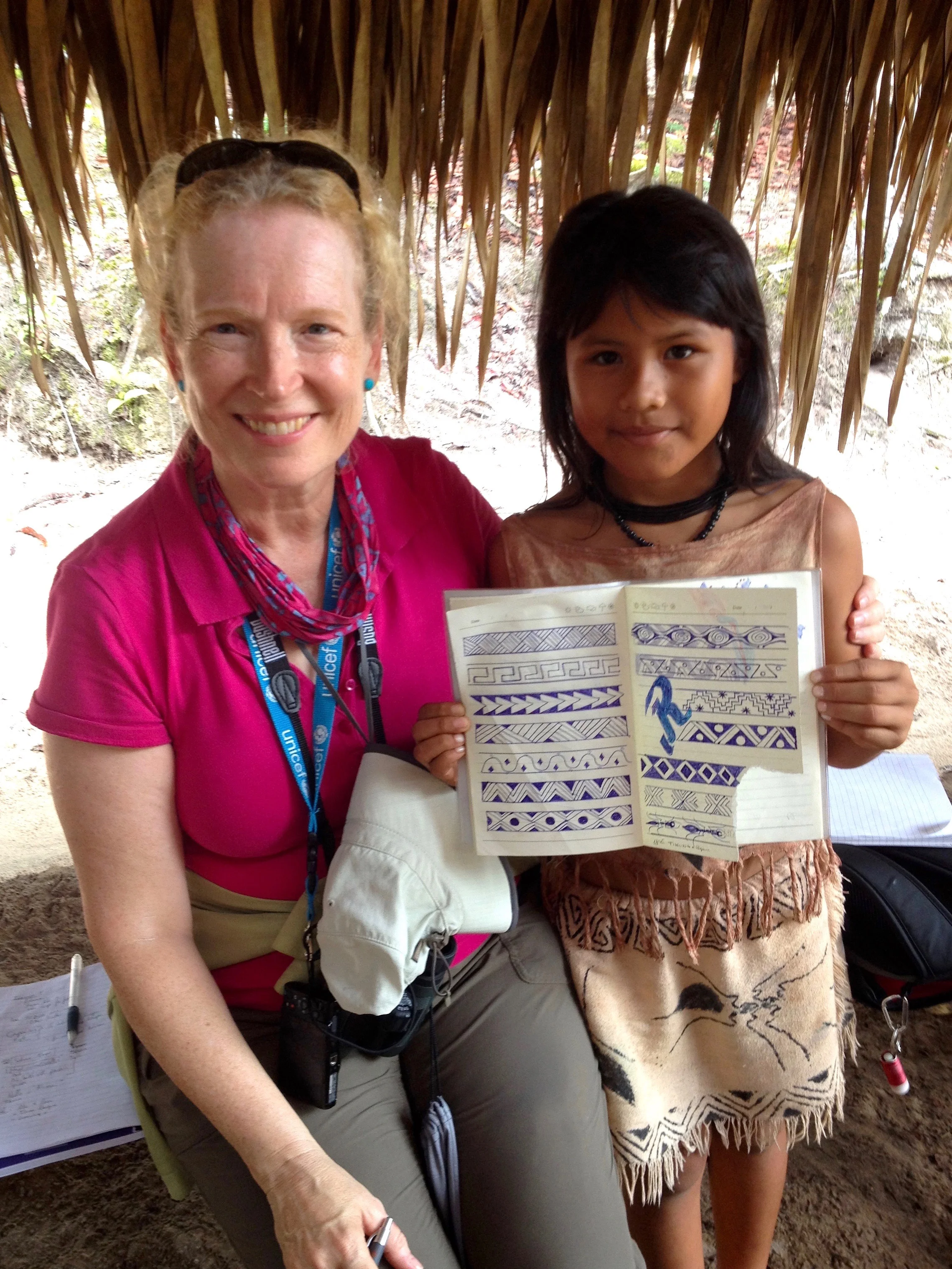 Indian Amazonian girl sharing her artwork.