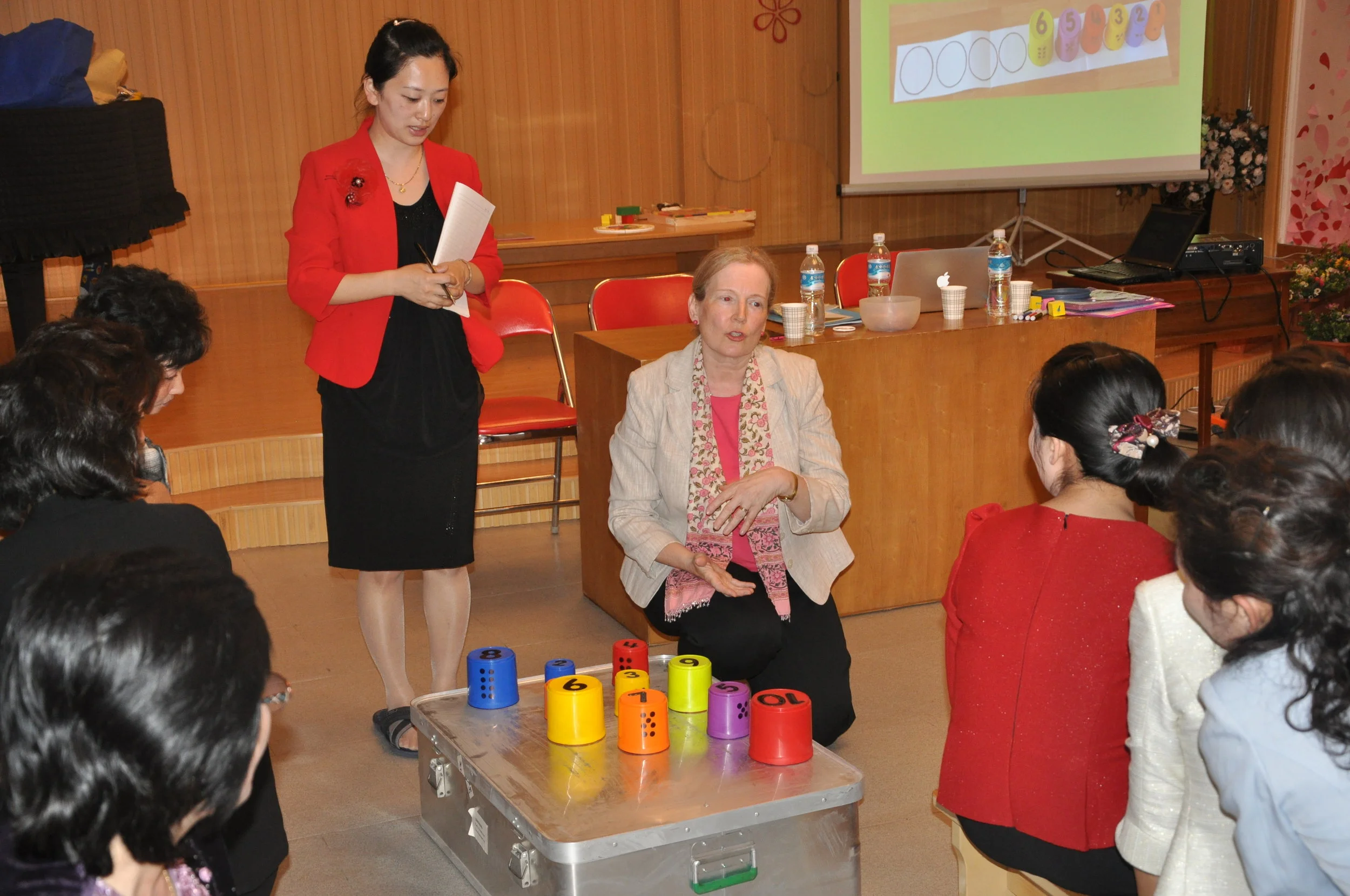  Conducting training for forty kindergarten teachers about child centered learning in Pyongyang in 2015. 
