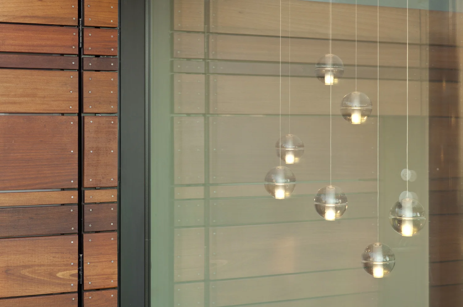 Penthouse renovation in San Francisco designed by Marin interior designer Studio SQUIRE featuring a Modern Sphere Light Fixture