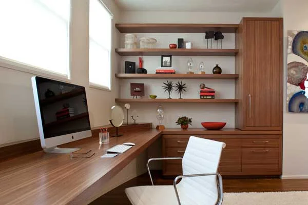 Office renovation in a San Francisco home designed by Marin interior designer Studio SQUIRE featuring Custom Wood Casework, Wood Desk, Eames Aluminum Group Chair, and Area Rug
