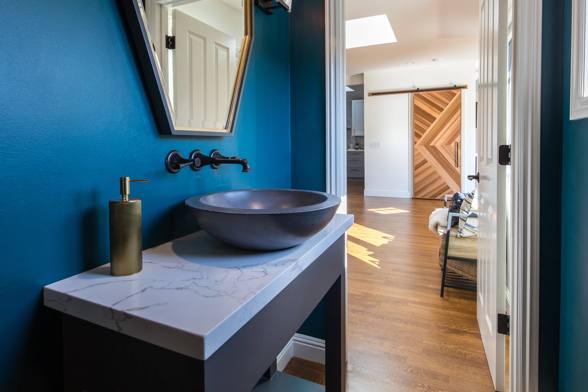 Powder Room renovation in Mill Valley designed by Marin interior designer Studio SQUIRE featuring Marble Vanity, Vessel Sink, and Teal Paint