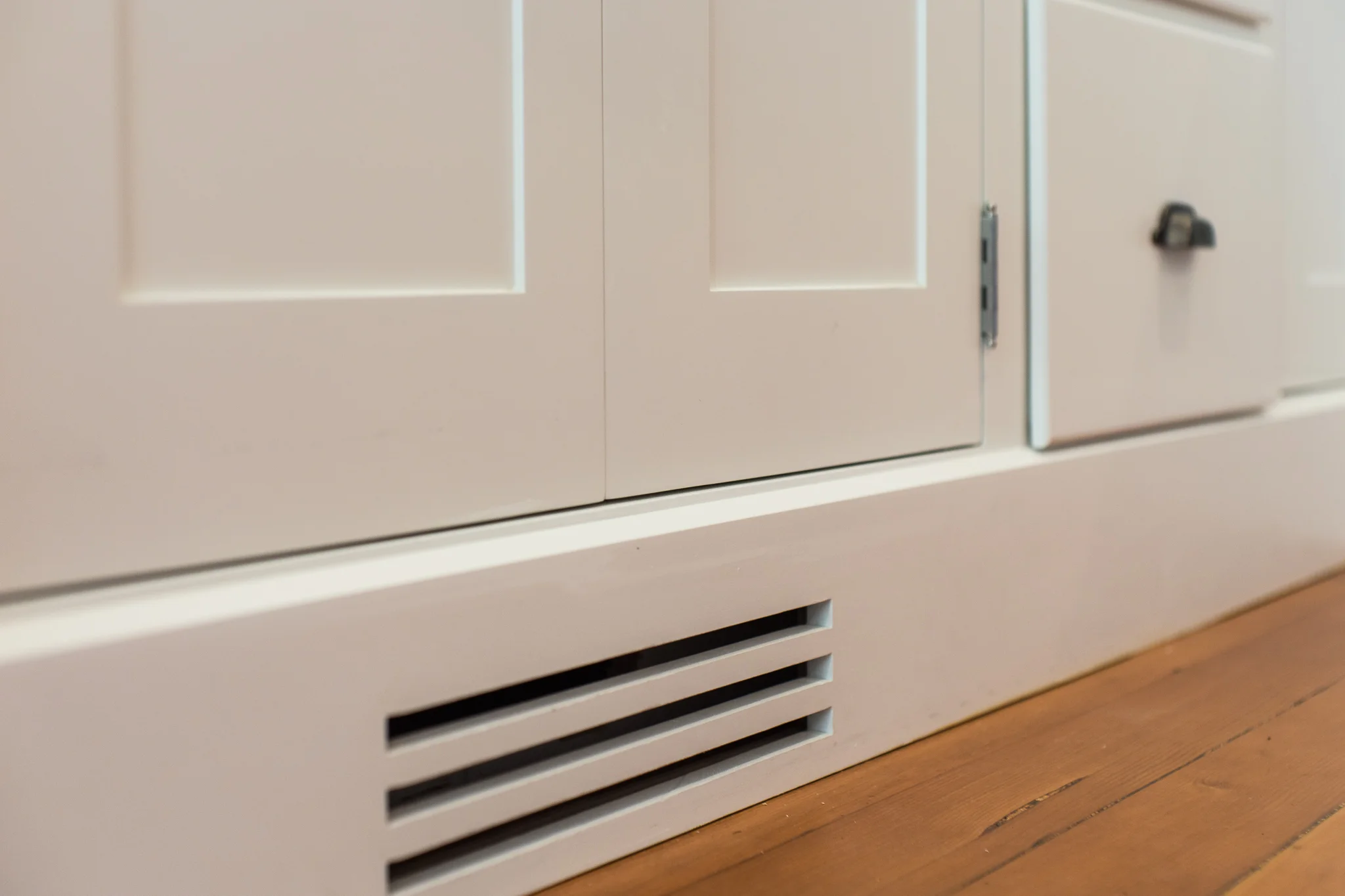 Kitchen renovation in Sausalito designed by Marin interior designer Studio SQUIRE featuring Routed Toe Kick