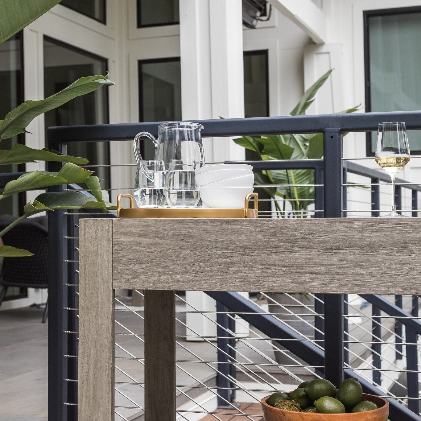 Elevate your entertaining skills by setting up an outdoor beverage station! Picture yourself sipping on a refreshing cocktail while basking in the warm evening air. Whether you're hosting a casual BBQ or a romantic night in, a simple outdoor console 