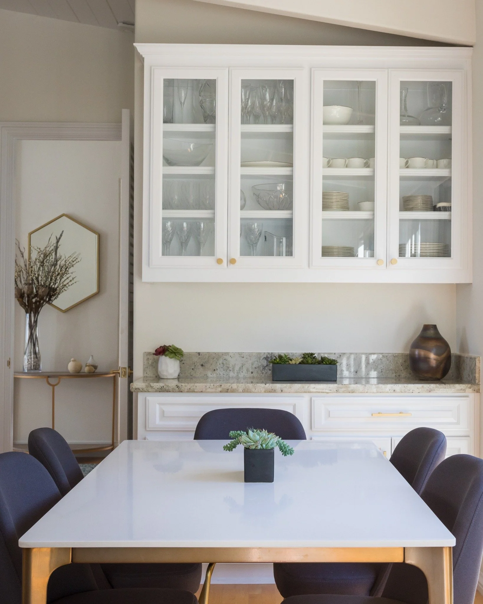 One of our favorite sustainable practices is resisting the urge to fill a space just to make it feel done.

Rooms like this work because they are thoughtful. The built-ins add function, the furnishings feel timeless, and even the styling is balanced 