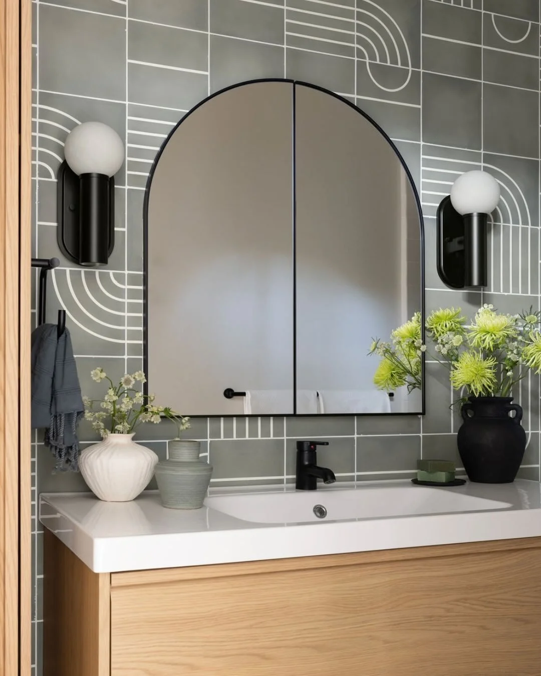 Some rooms call for restraint. Others give you permission to have a little more fun.

For this bathroom, tile became the starting point for bringing personality into the space. Rather than choosing something that would simply disappear into the backg