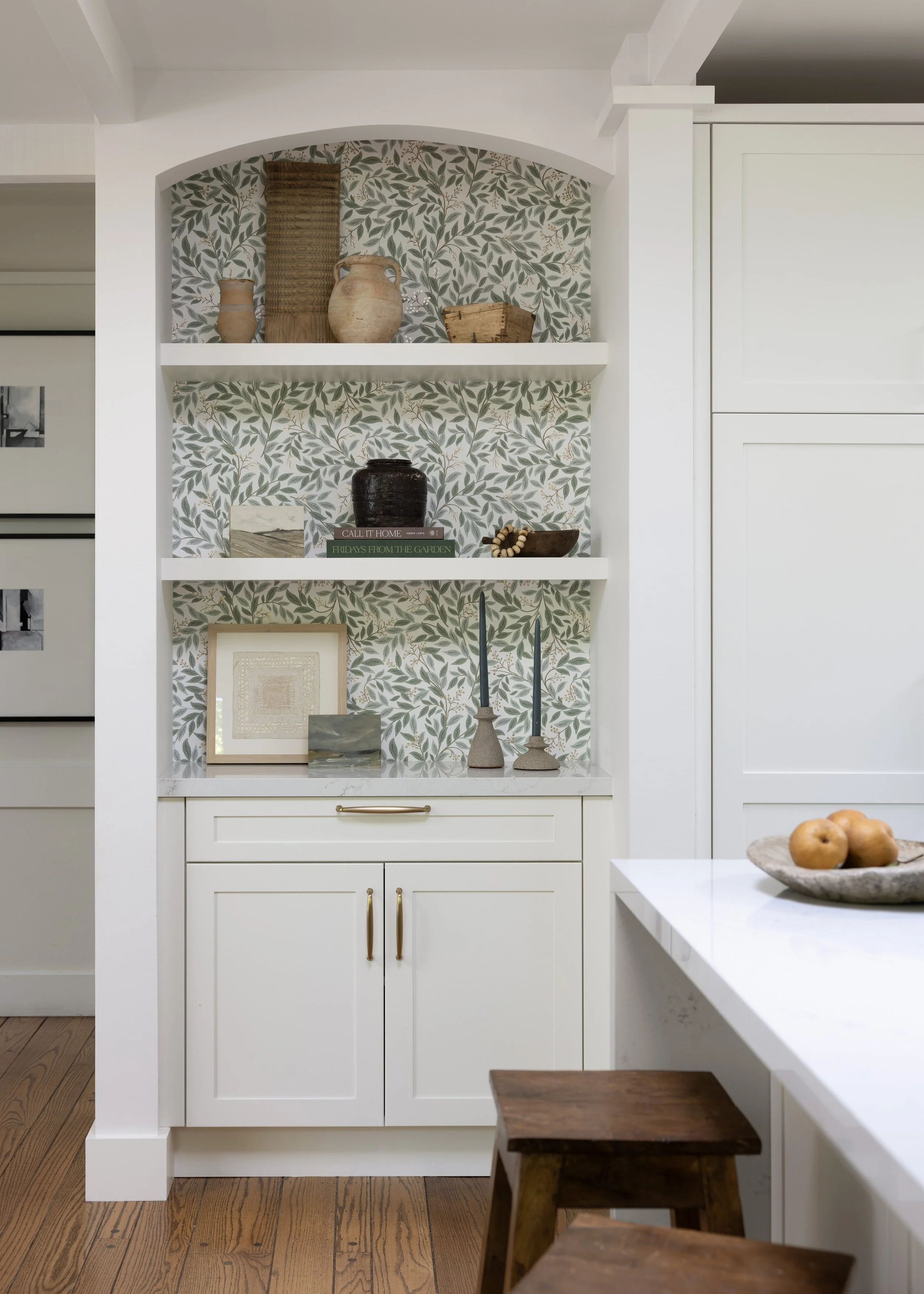Kitchen renovation in Kentfield designed by Marin interior designer Studio SQUIRE featuring Floral Wallpaper, Custom Cabinetry, Brass Hardware, Shelving, and Quartz Countertop