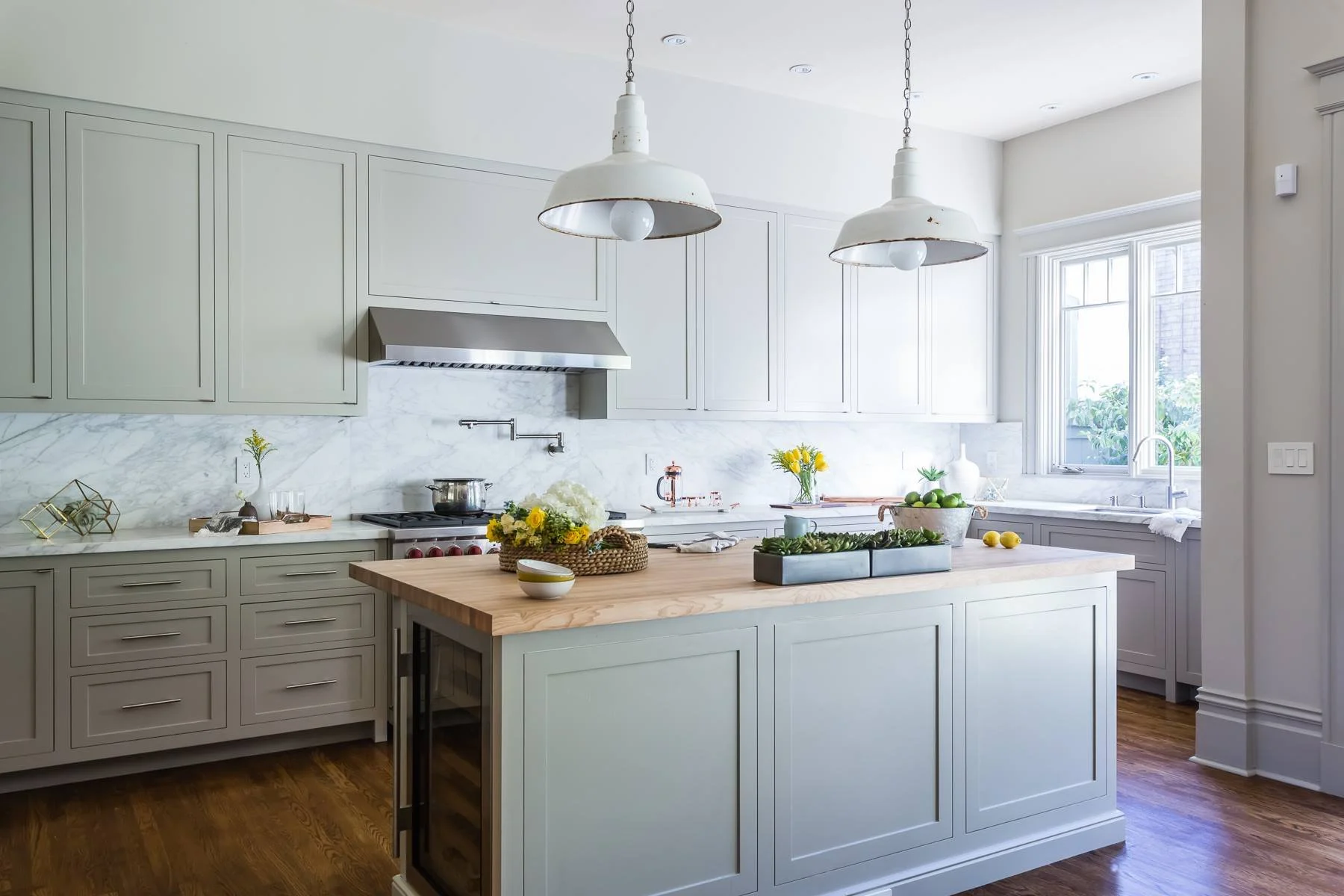 Studio SQUIRE | Interior Design | Marin and SF Bay Area | Custom Kitchen | Light Green Cabinets | Marble Backsplash | Vintage Lighting Fixtures