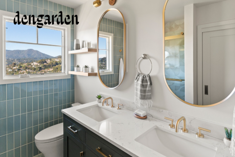 Bathroom renovation in Tiburon designed by Marin interior designer Studio SQUIRE featuring light blue tile, olive green vanity, wood shelves, and brass fixtures