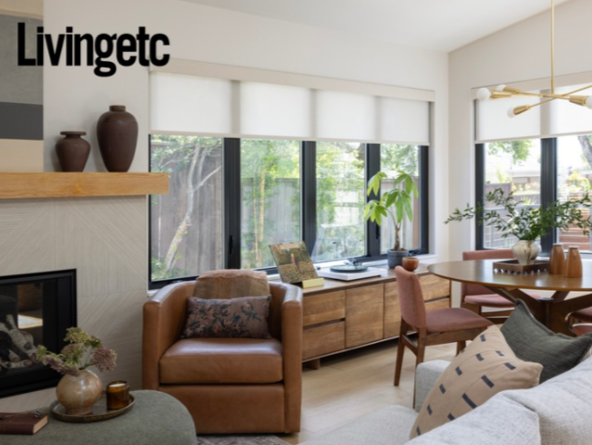 Living Room renovation in Mill Valley designed by Marin interior designer Studio SQUIRE featuring a custom fireplace surround, leather accent chair, wood console, and brass light fixture