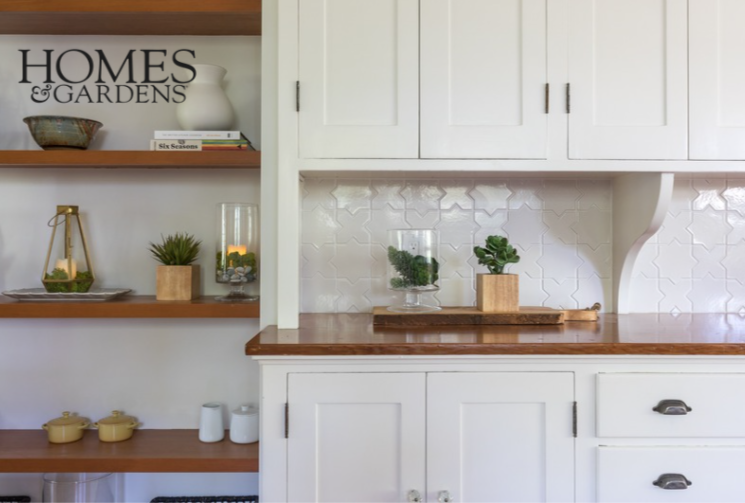Kitchen renovation in Sausalito designed by Marin interior designer Studio SQUIRE featuring shaker style cabinetry, handmade tile, and wood shelves