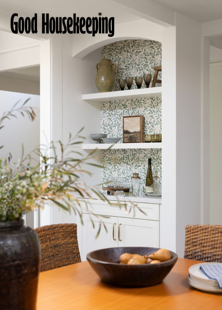 Kitchen renovation in Kentfield designed by Marin interior designer Studio SQUIRE featuring accent wallpaper, brass hardware, and custom built ins