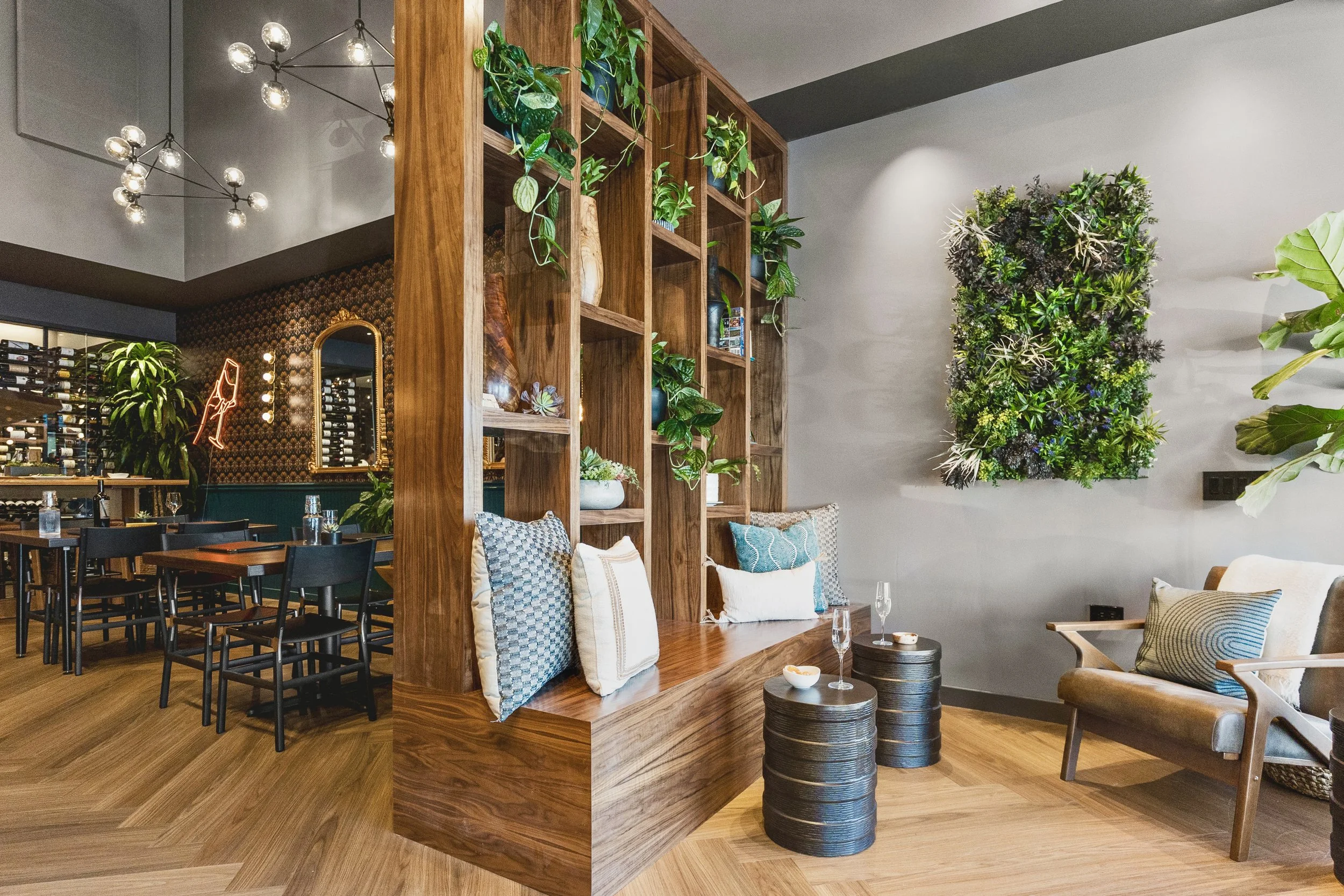 Wine bar renovation in Tiburon designed by Marin interior designer Studio SQUIRE featuring a Accent Chair, Wood Shelving, and Greenery Wall