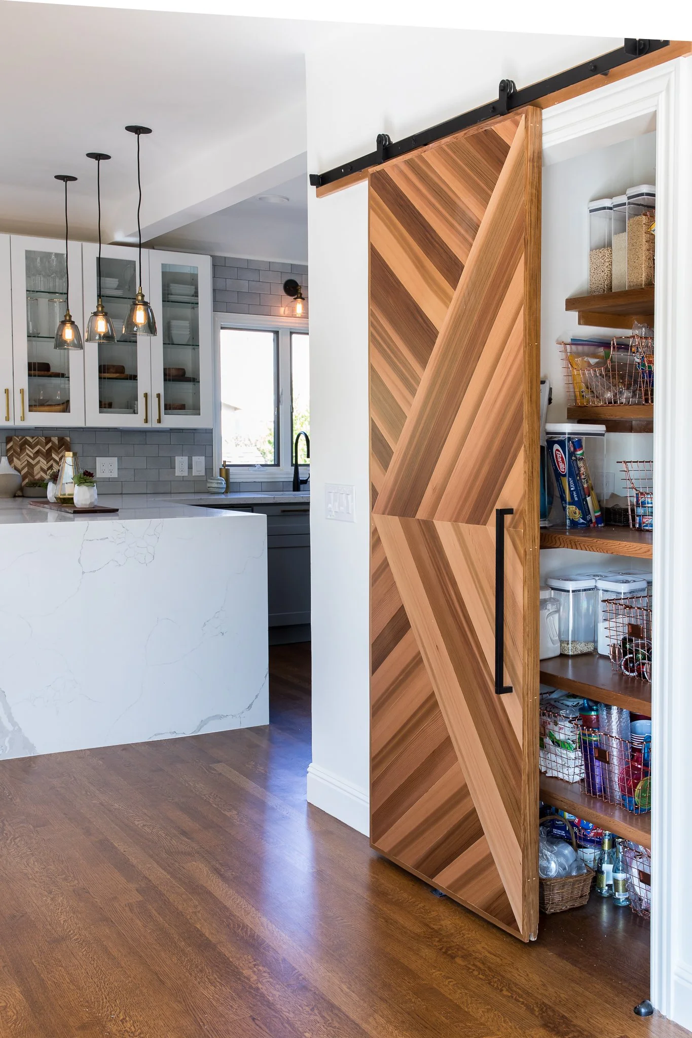 Studio Squire | Interior Design | Marin and SF Bay Area | Pantry with Sliding Wood Door