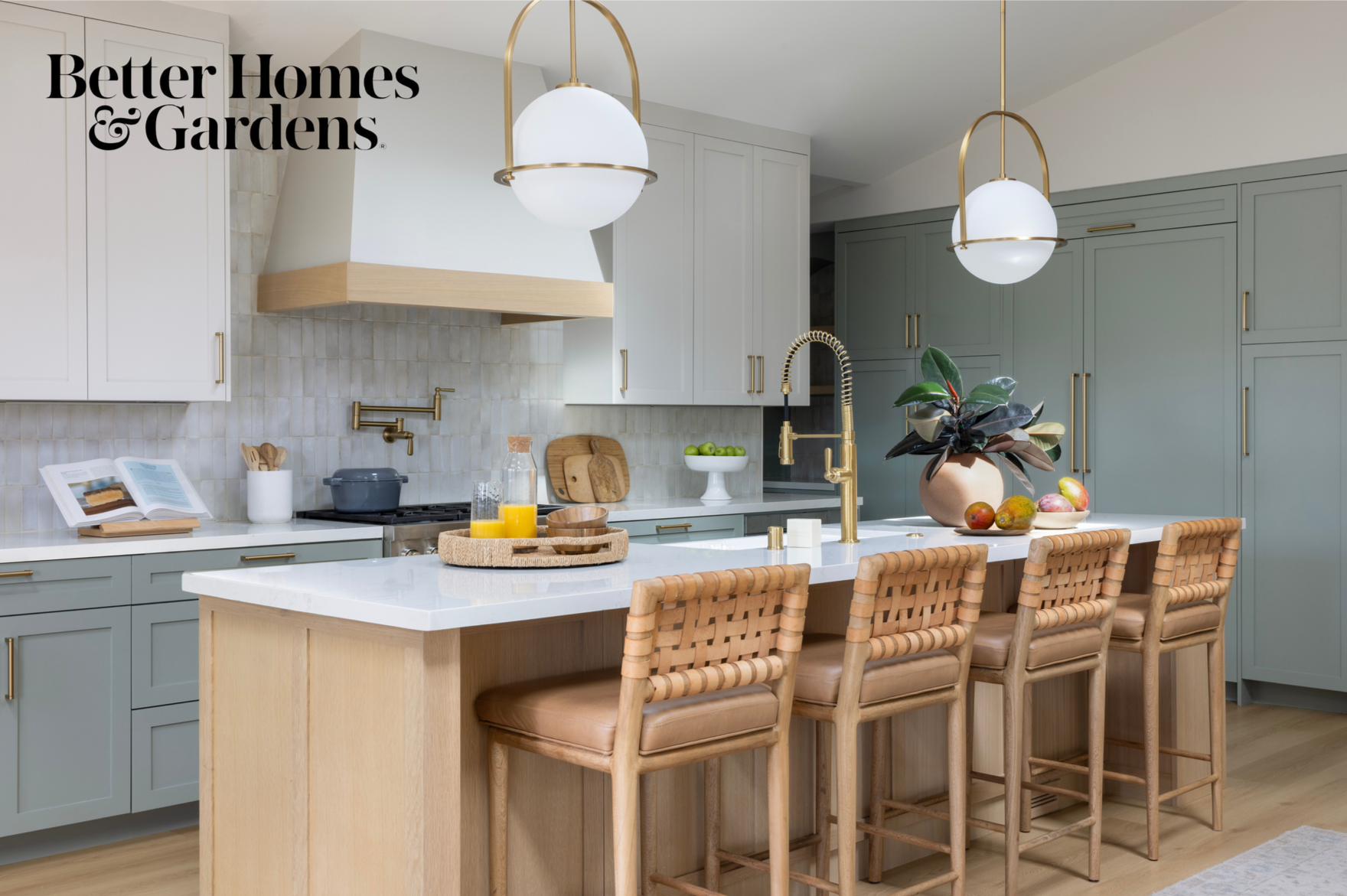 Kitchen renovation in Mill Valley designed by Marin interior designer Studio SQUIRE featuring sage green cabinets, soft white cabinets, oak island, and brass fixtures