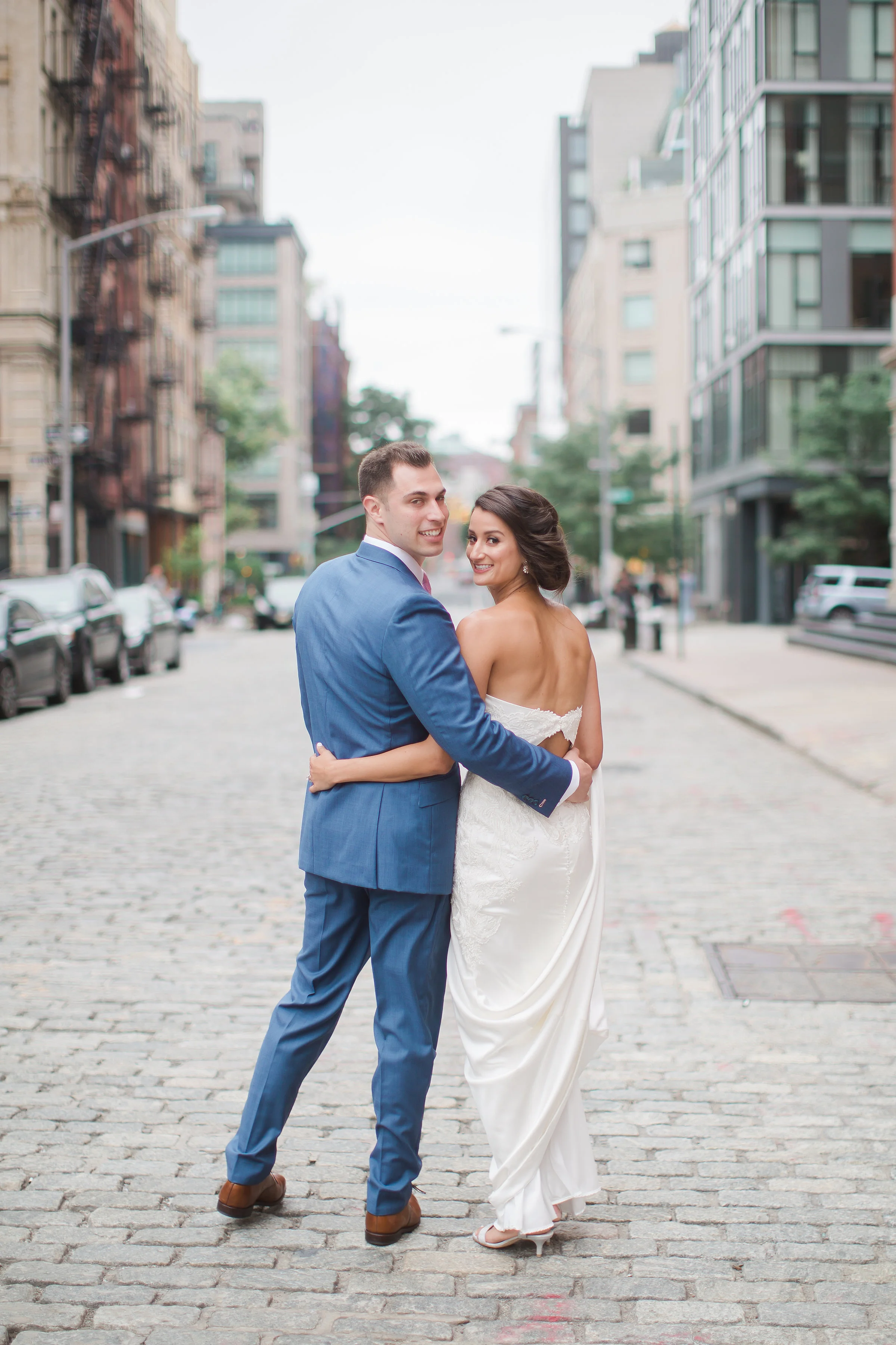 Bride and Groom walk together on the streets of Tribeca