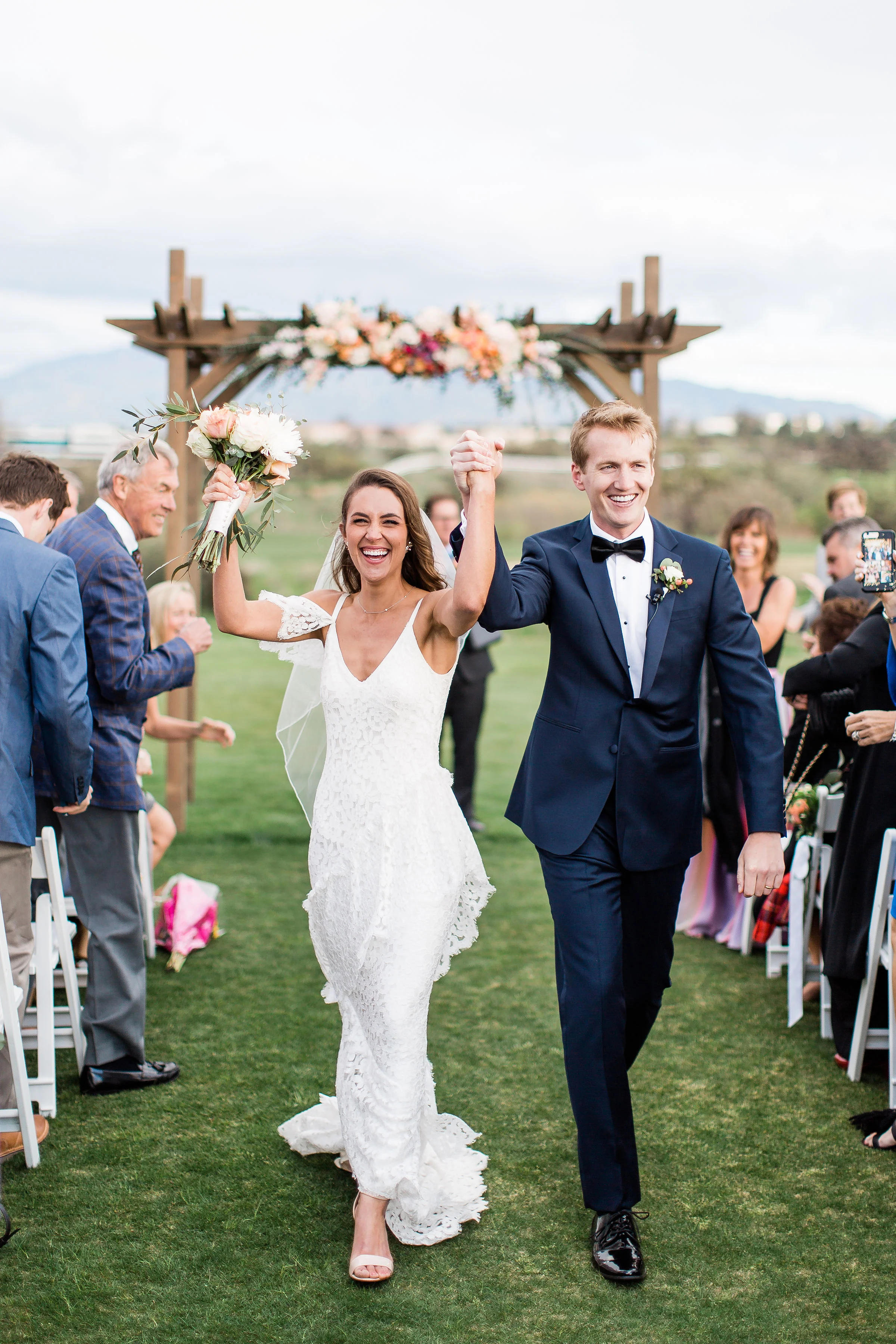 Bride and Groom walk down the aisle during recessional