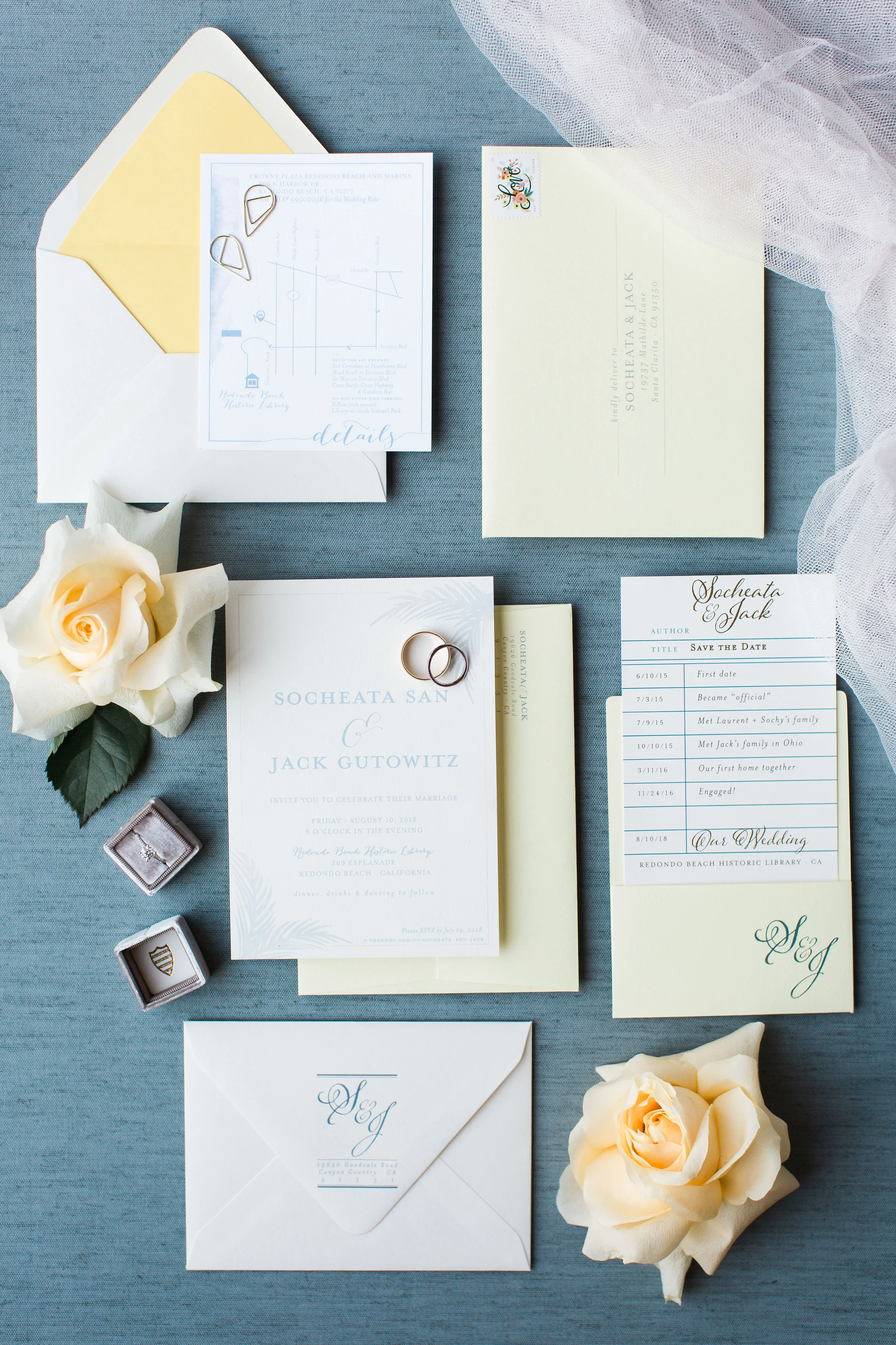 styled image of wedding invitations