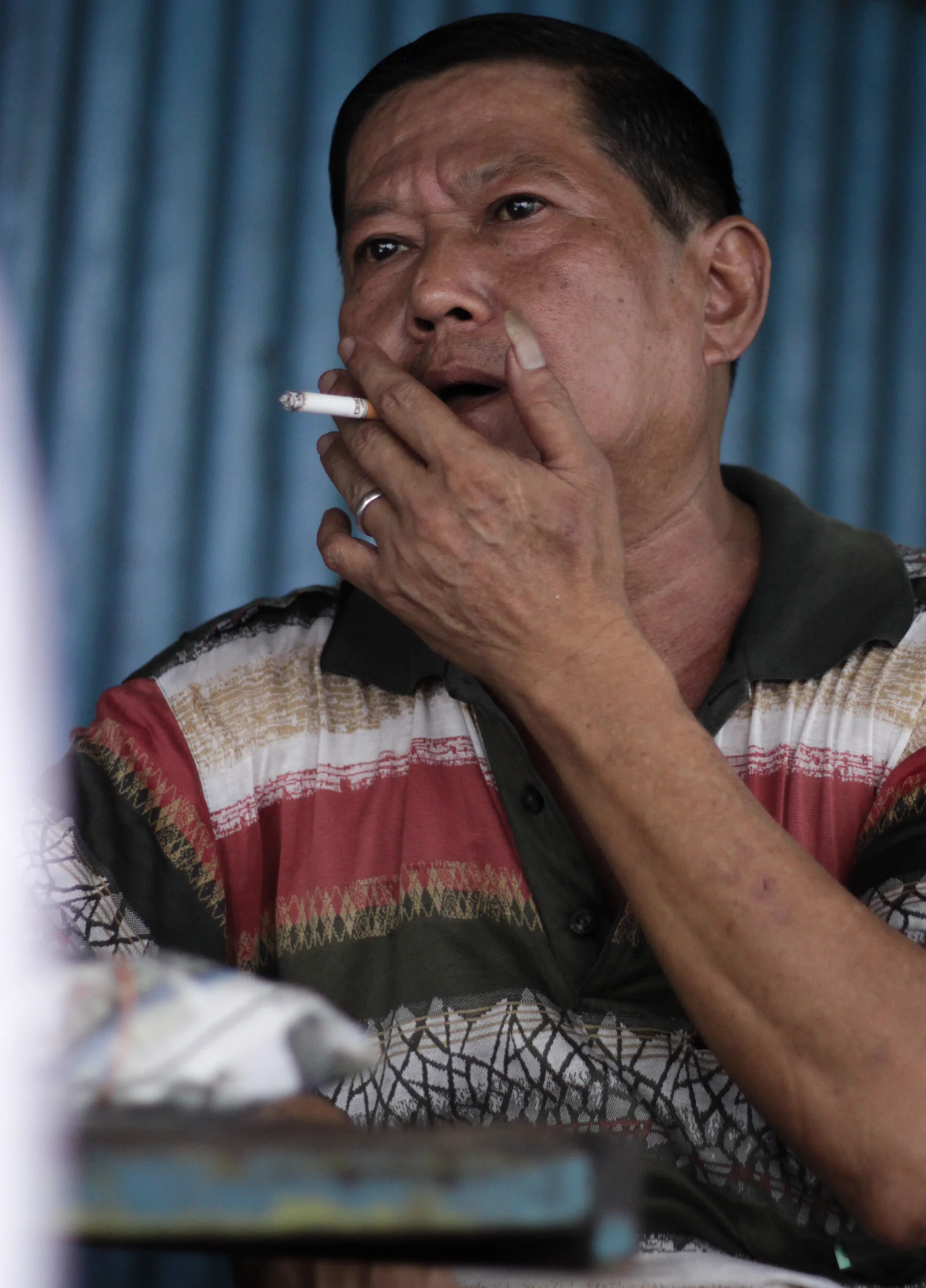 A Cigarette Break - Malacca, Malaysia 