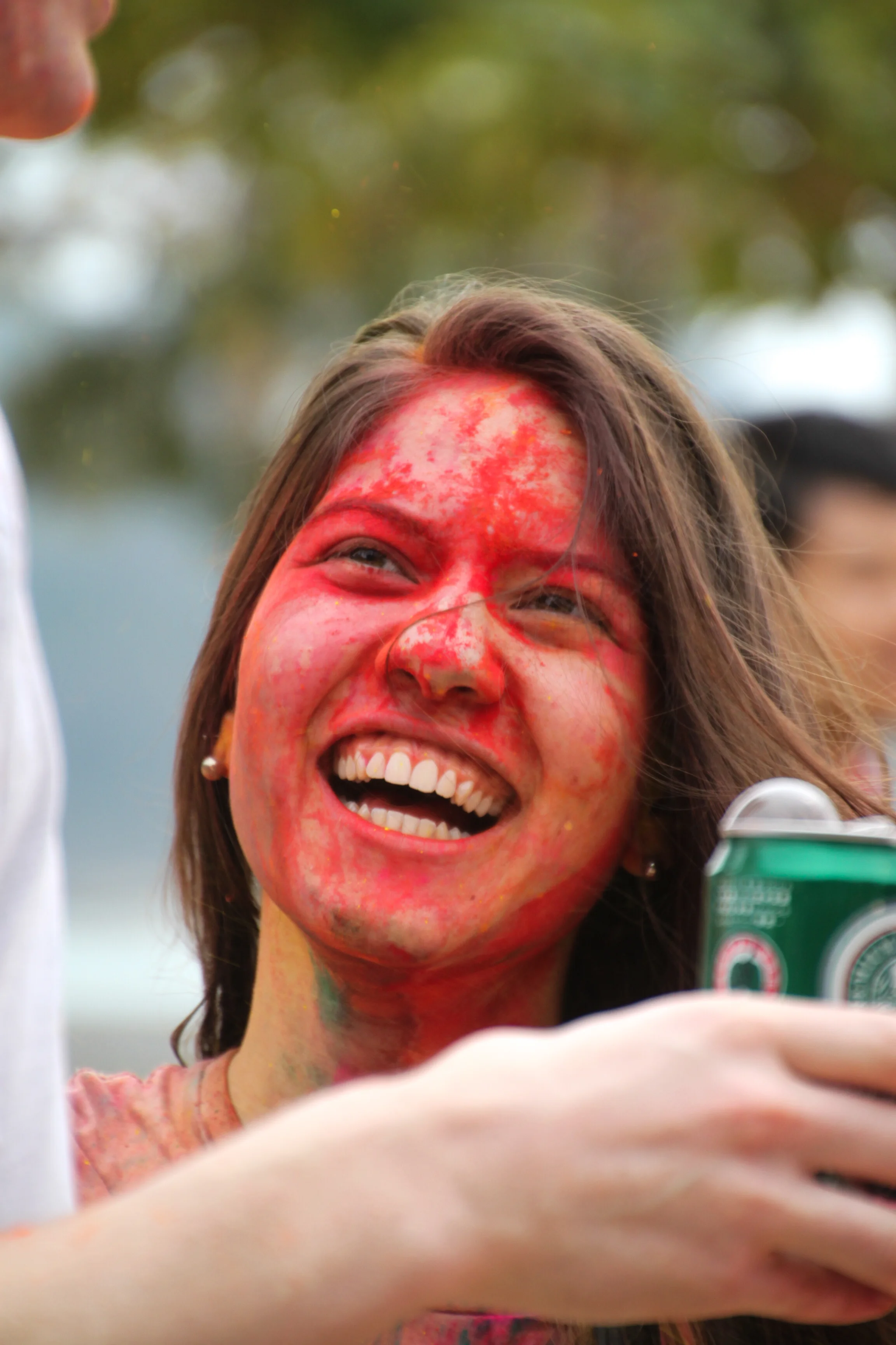  Angie, a second-year undergraduate student at The University of Hong Kong, enjoys her first "Holi" celebration by the beach. Holi, India's festival of colors, is celebrated and hosted by the university's South Asian Society.    