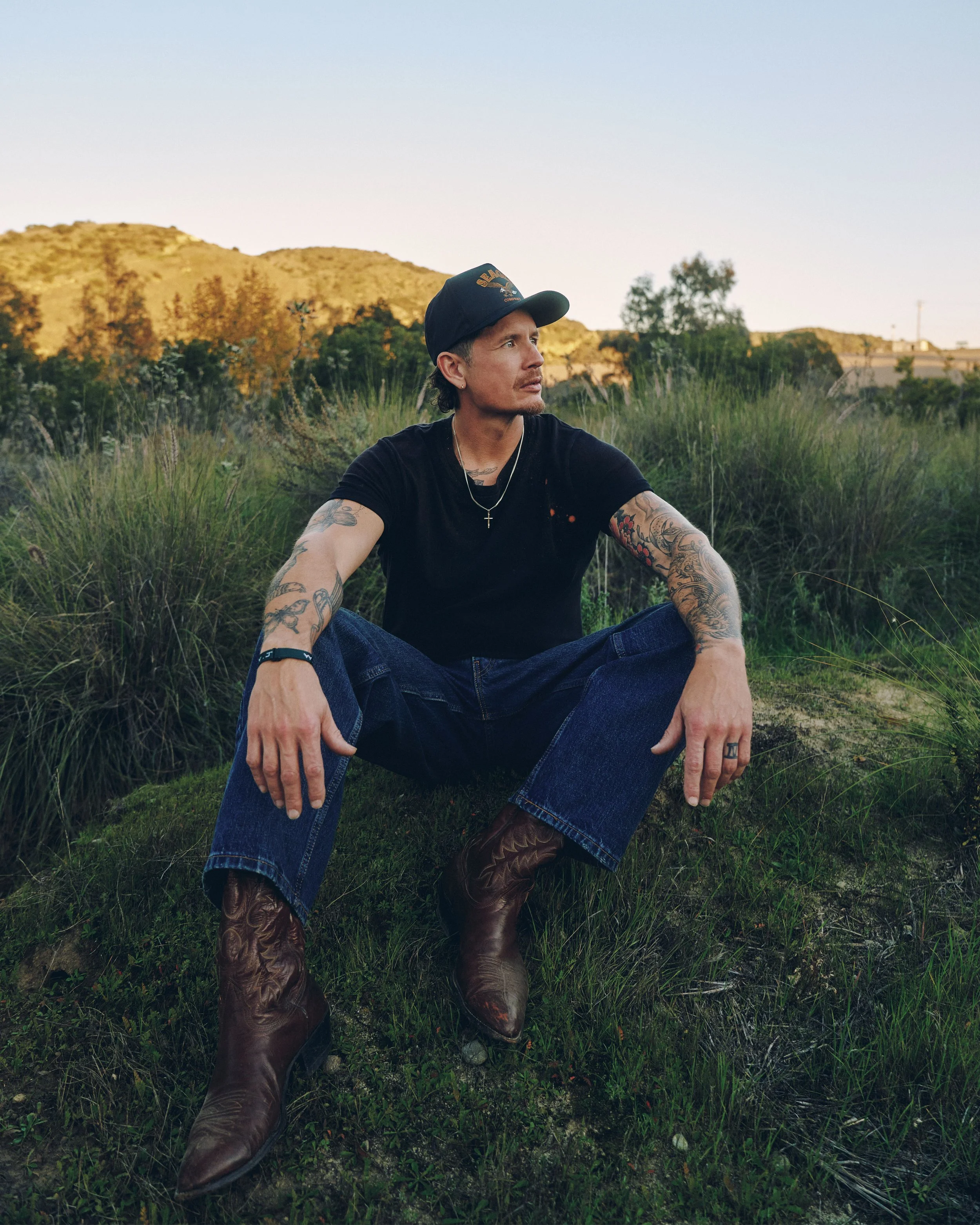 michael-ketterer-james-davis-ii-orange-county-photographer-field-cowboy-boots-golden-hour.jpg