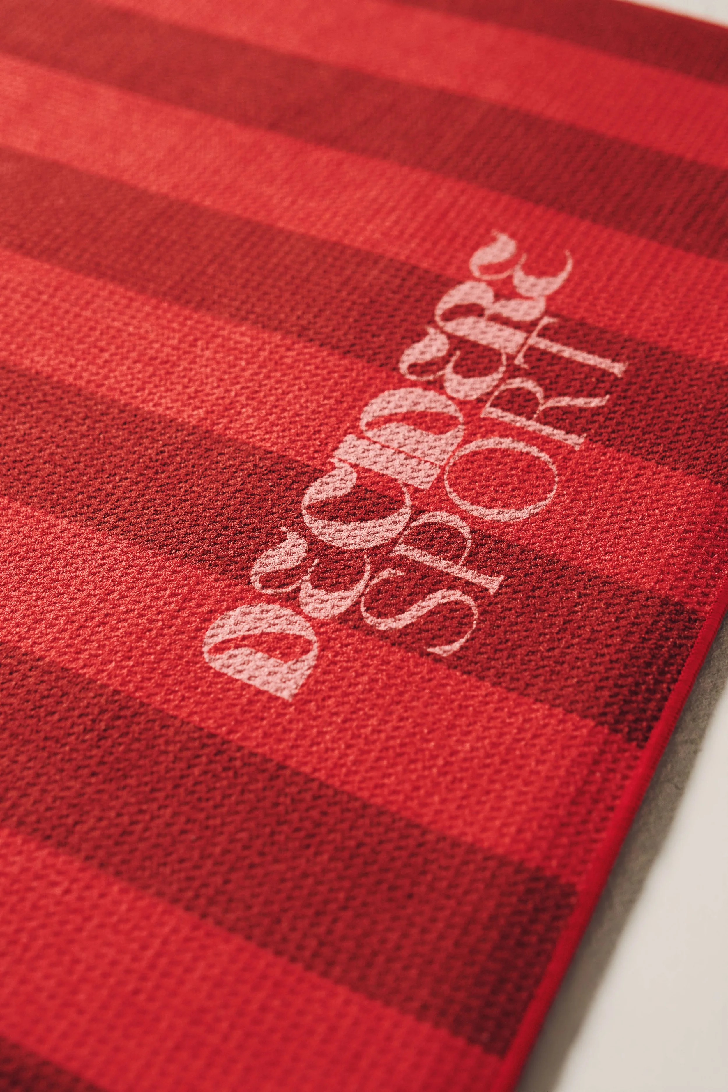 james-davis-commercial-photography-decidere-sport-red-striped-logo-gym-towel.jpg