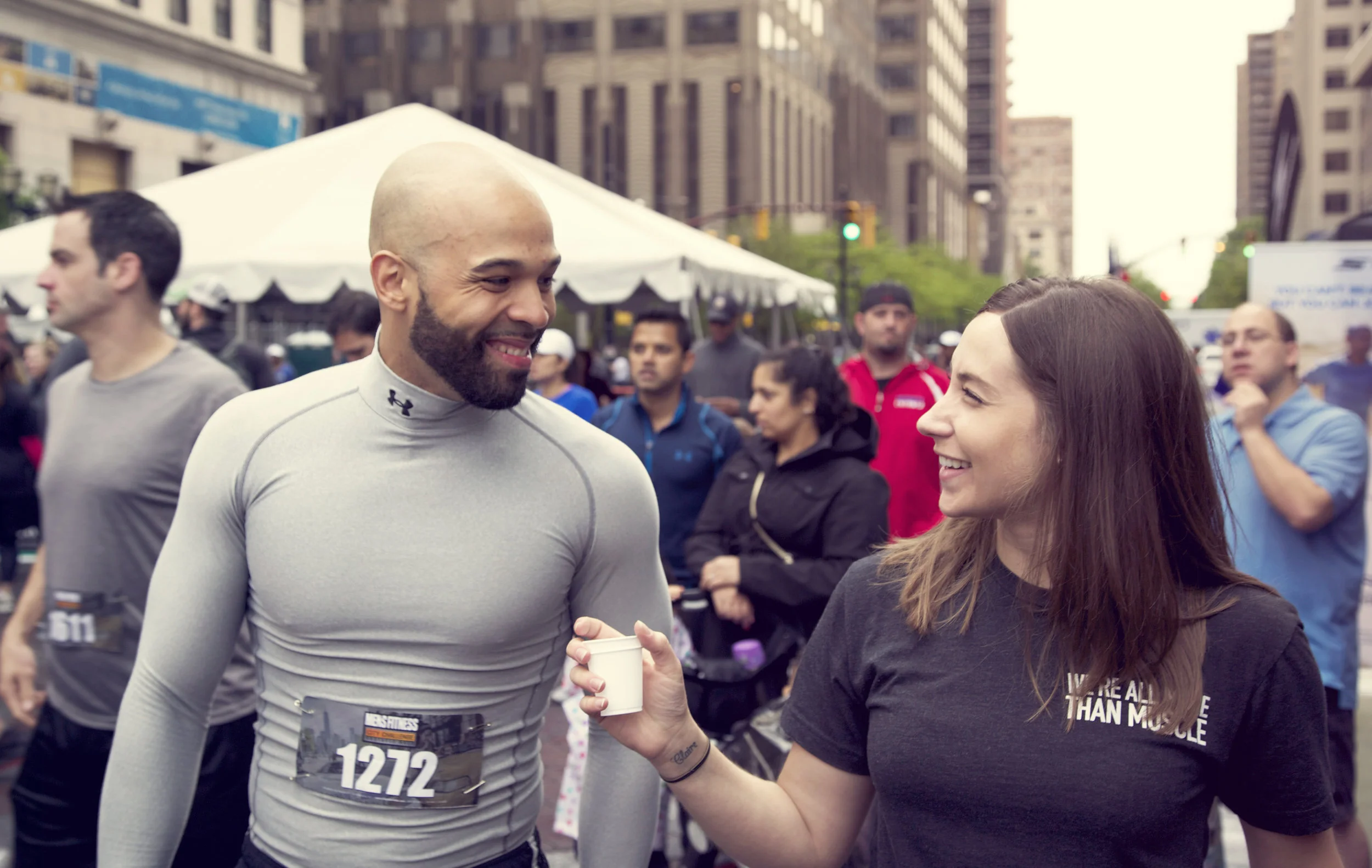 On May 16, 2015, Isopure partnered with Men’s Fitness magazine to host the first Men’s Fitness City Challenge Obstacle Race, in Jersey City, N.J. For Isopure, the event provided a perfect opportunity to enhance brand exposure in the New York City market and to the magazine’s readership. Plus, having the New York City skyline as a photographic backdrop always makes for great images! But this was no mere photo opp. Athletes were tasked with conquering a course that featured 26 different obstacles, from climbing cargo nets to performing bear crawls. Alicia worked to promote Isopure’s product at the sponsor village, where participants mingled with Isopure’s sponsored athlete, Rafique , and were given gift bags that included samples of the company’s “Zero Carb” protein powder.