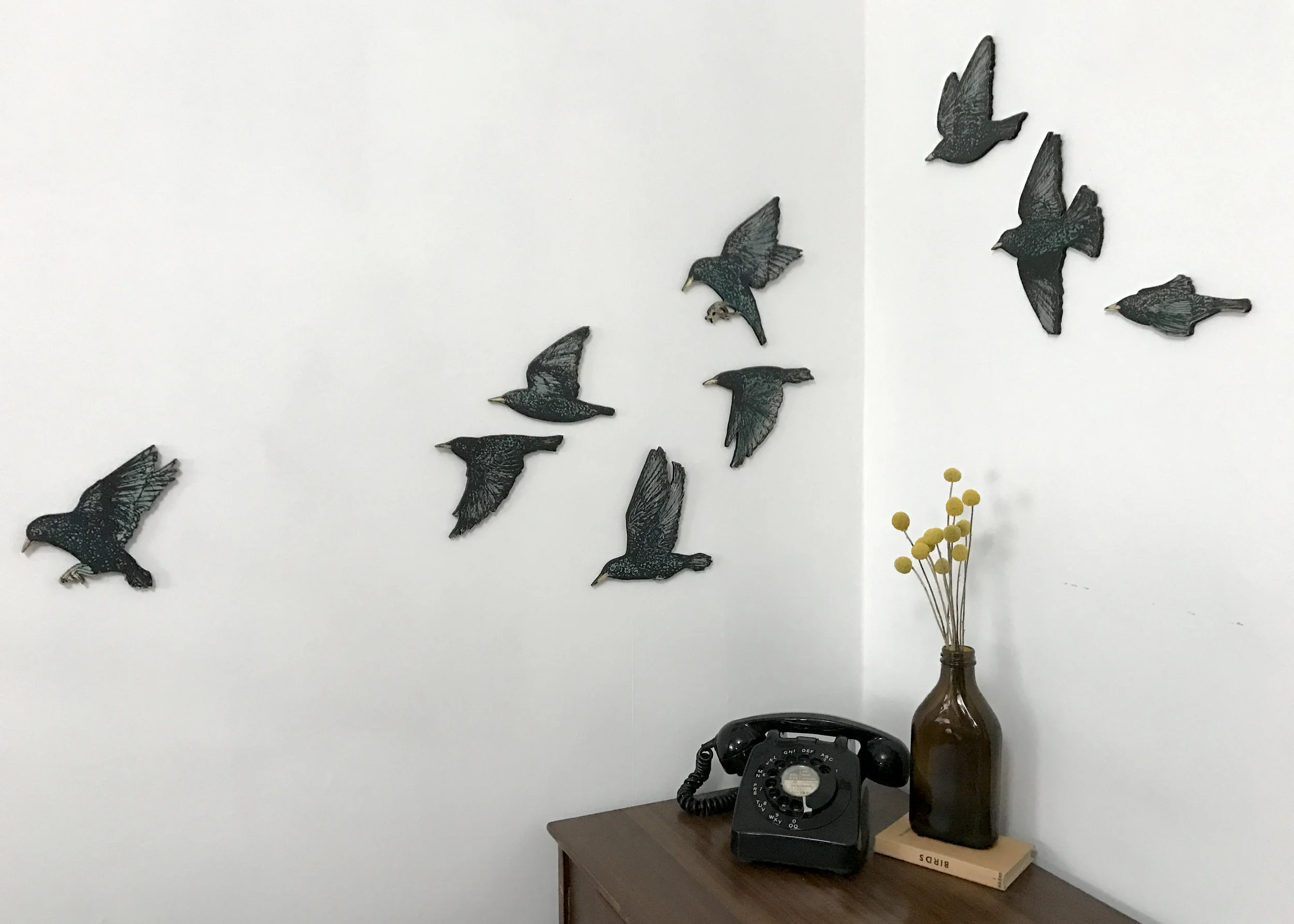 Murmuration of starling. 2017 Screen printed wooden installation. Edition of 12 sets of 9 birds. SOLD OUT