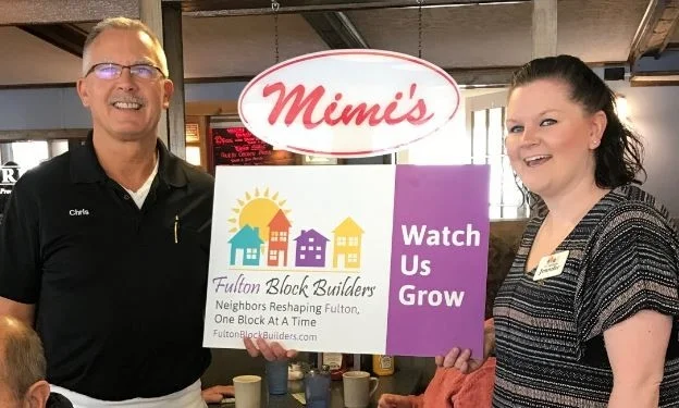 Jennifer Whalen from FBB is seen here with Chris Sachel after receiving a BLOCK BUILDER donation from Mimi’s Diner. Patrons of Mimi’s will find delicious sandwiches and other American favorites at Mimi's Drive Inn in Fulton. Prices at Mimi's are a bargain, so you'll have plenty of cash left over to treat a friend (or two). Mimi's Drive Inn is a great place to go for lunch or dinner, so make your way over to the restaurant today and munch on an American classic. And let Chris and the gang know how much you appreciate their support of the Fulton Block Builder program!