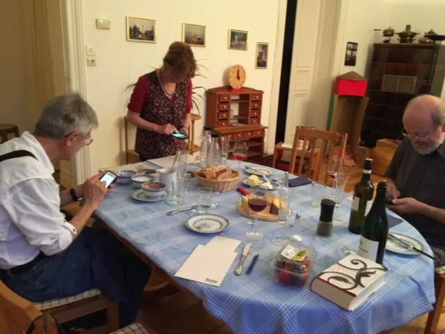 Three techies ignoring each other.