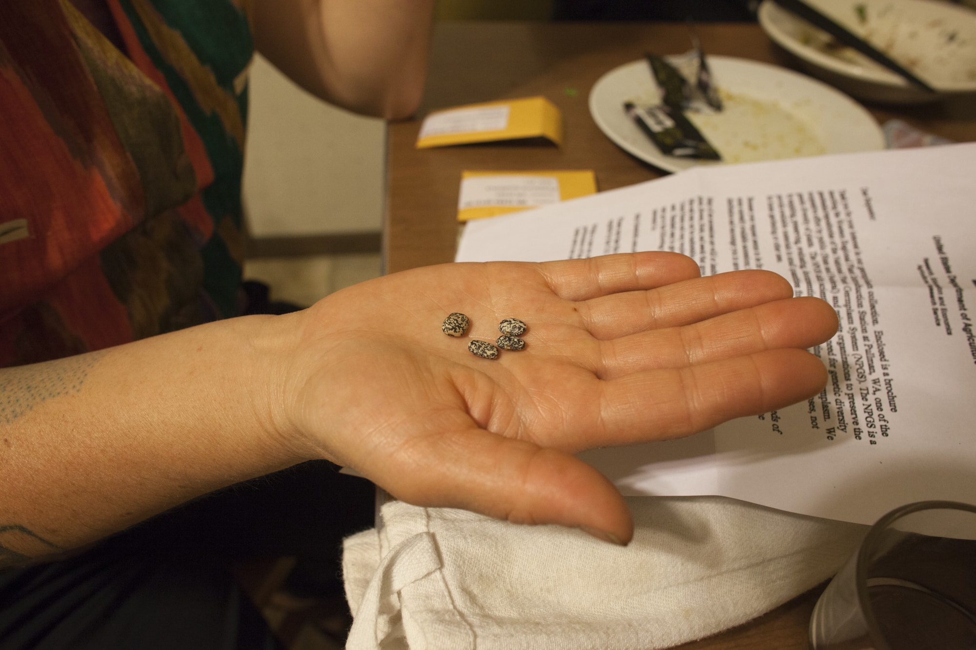   Ginger Brooks Takahashi showing seeds, 10 April 2017. Photo by Colter Harper  